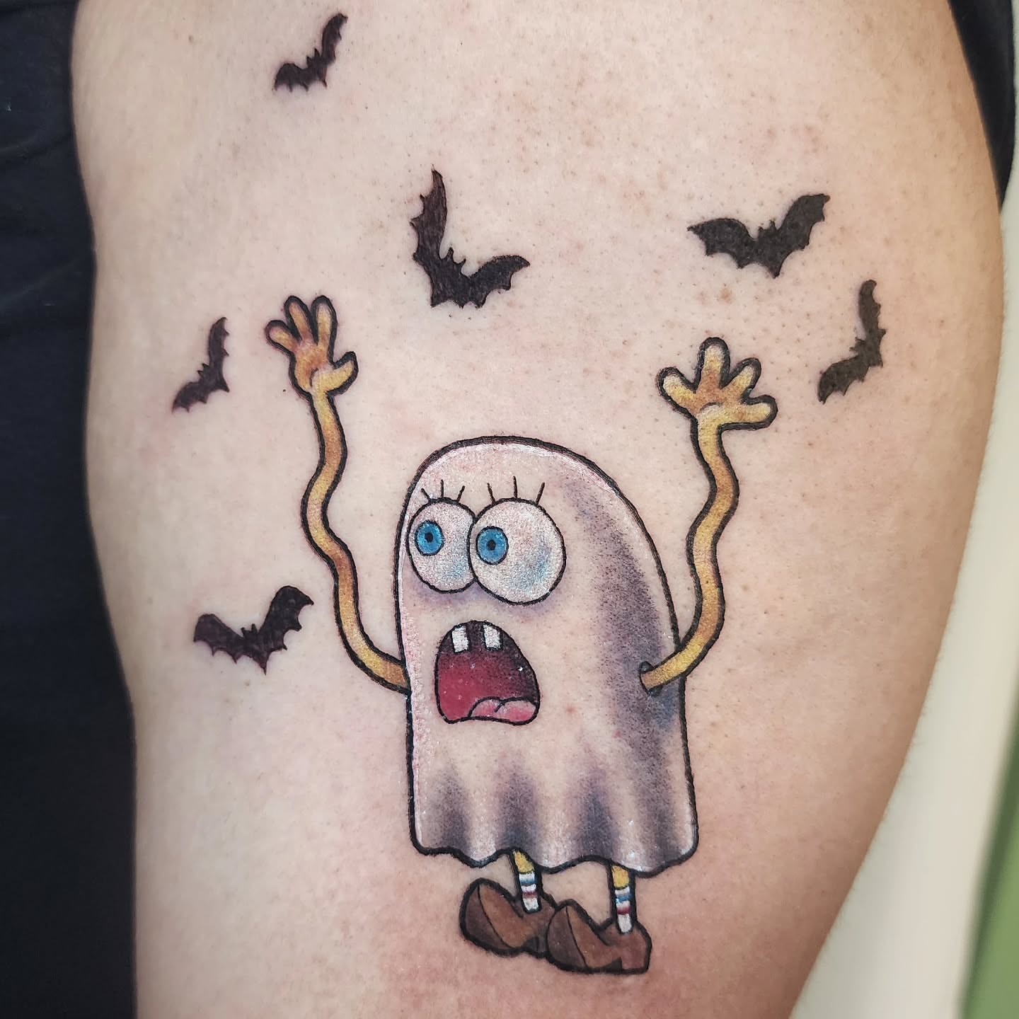 Spooky ghost dotwork tattoo on the thigh by Lindsey Andrew, Englewood, Colorado