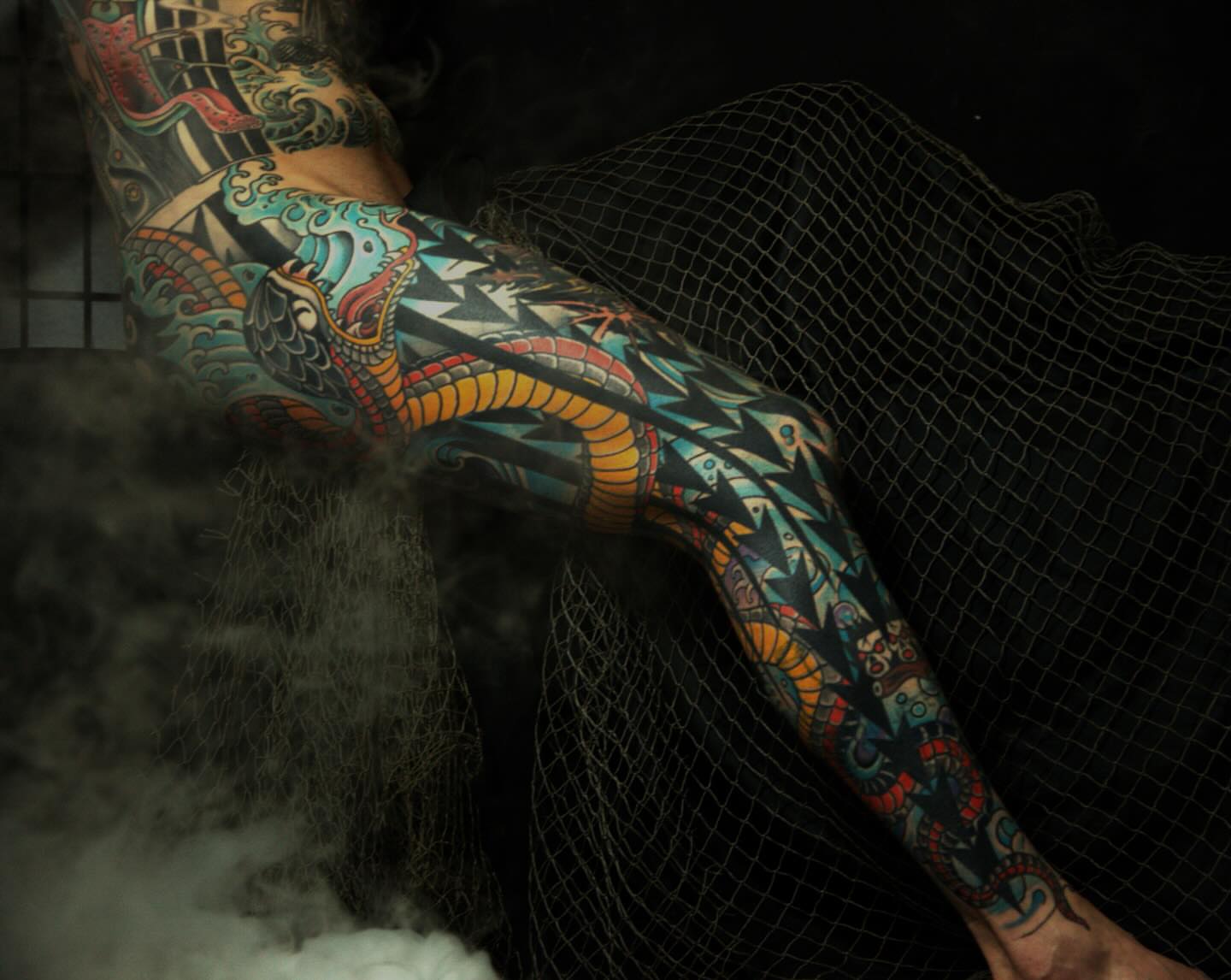 Dragon American traditional tattoo on the thigh by Chris Kline