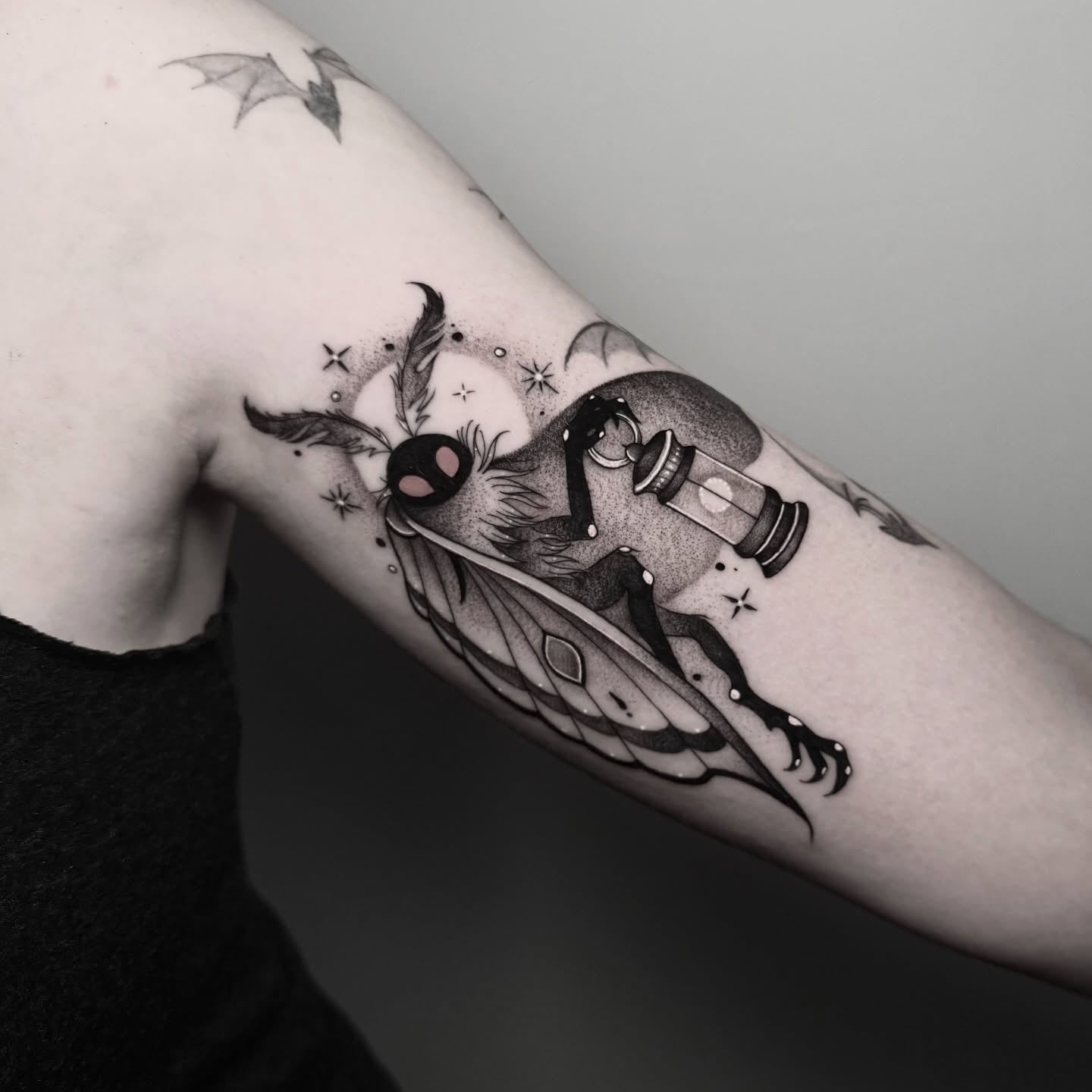 Insect with lantern dotwork tattoo on the forearm by ɪᴠᴏɴɴᴇ