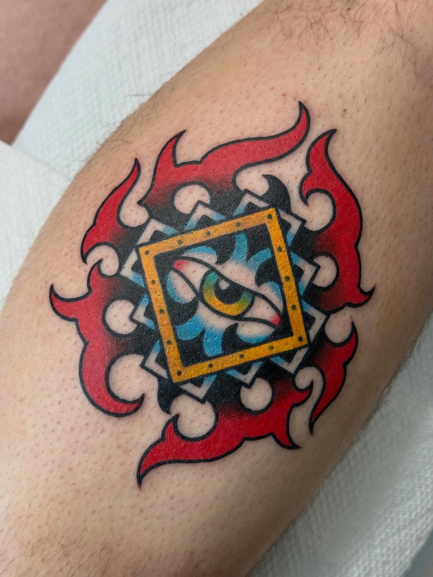 Eye within flame American traditional tattoo on the forearm by Big Al