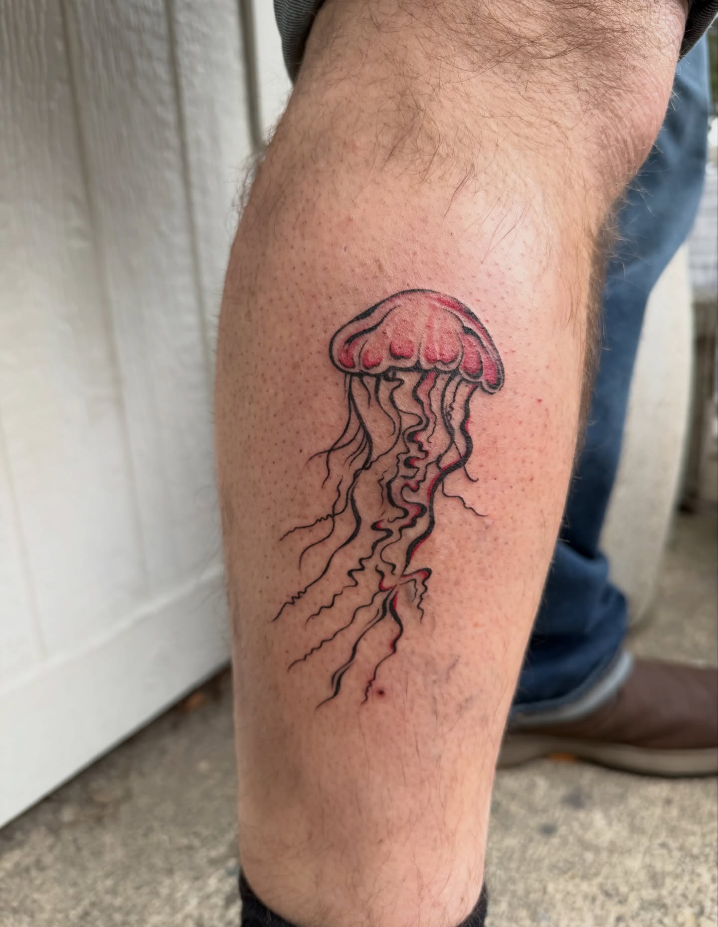 Jellyfish realism tattoo on the forearm by Kingtide Ink