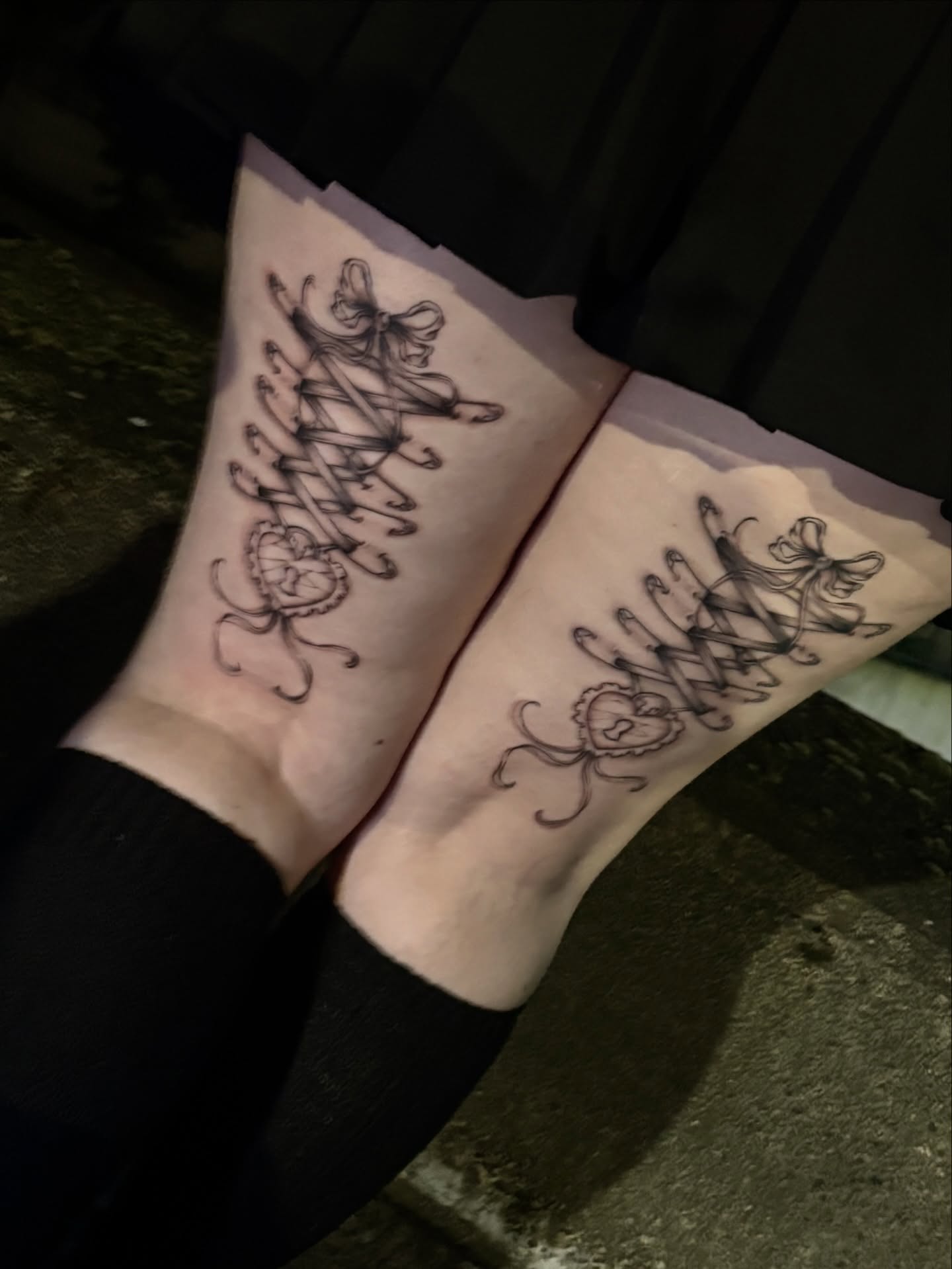 Bow and ribbon black and grey tattoo on the forearm by Silvia :)