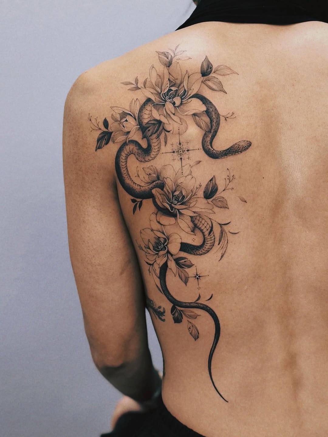 Tattoo by @angel.flow144 — fine_line, black_and_grey