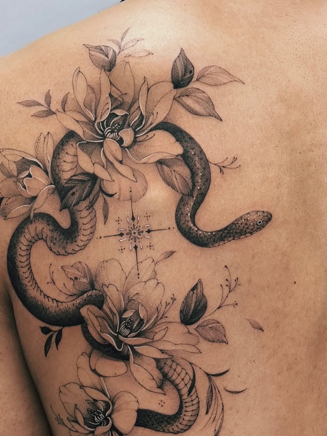 Tattoo by @angel.flow144 — fine_line, black_and_grey