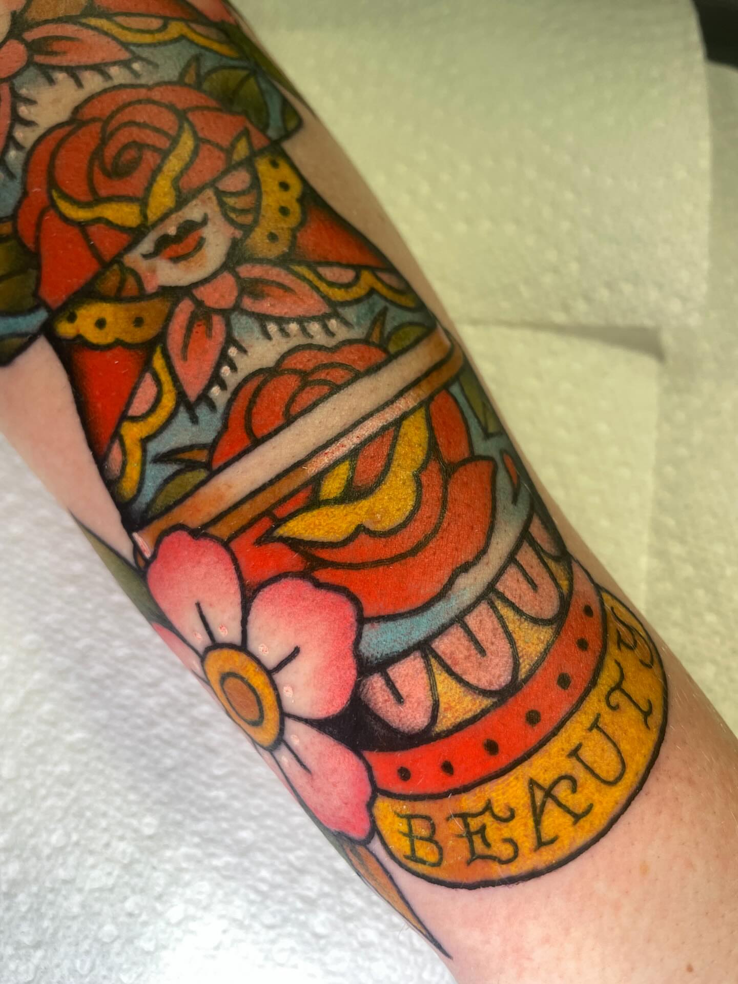 Beauty American traditional tattoo on the forearm by Eric (EK) Kuldell