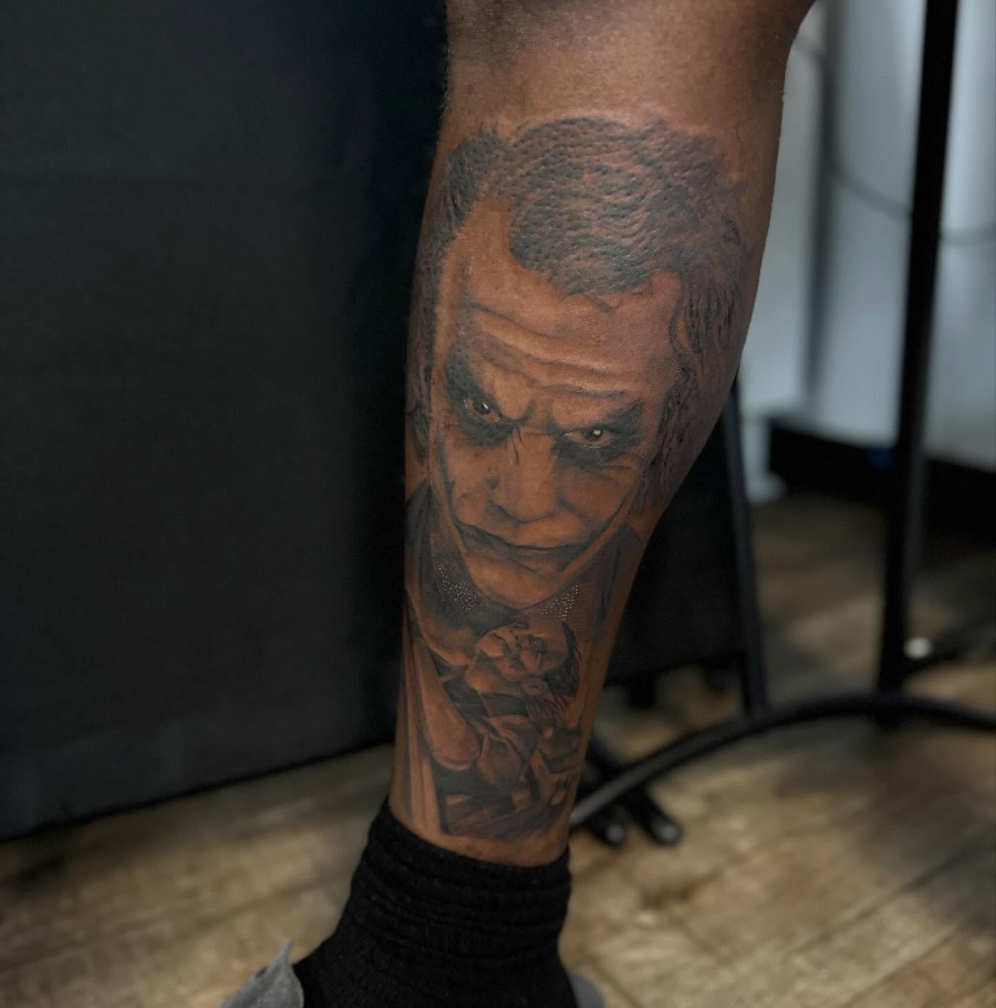 Joker realism tattoo on the forearm by Jordan Clifford