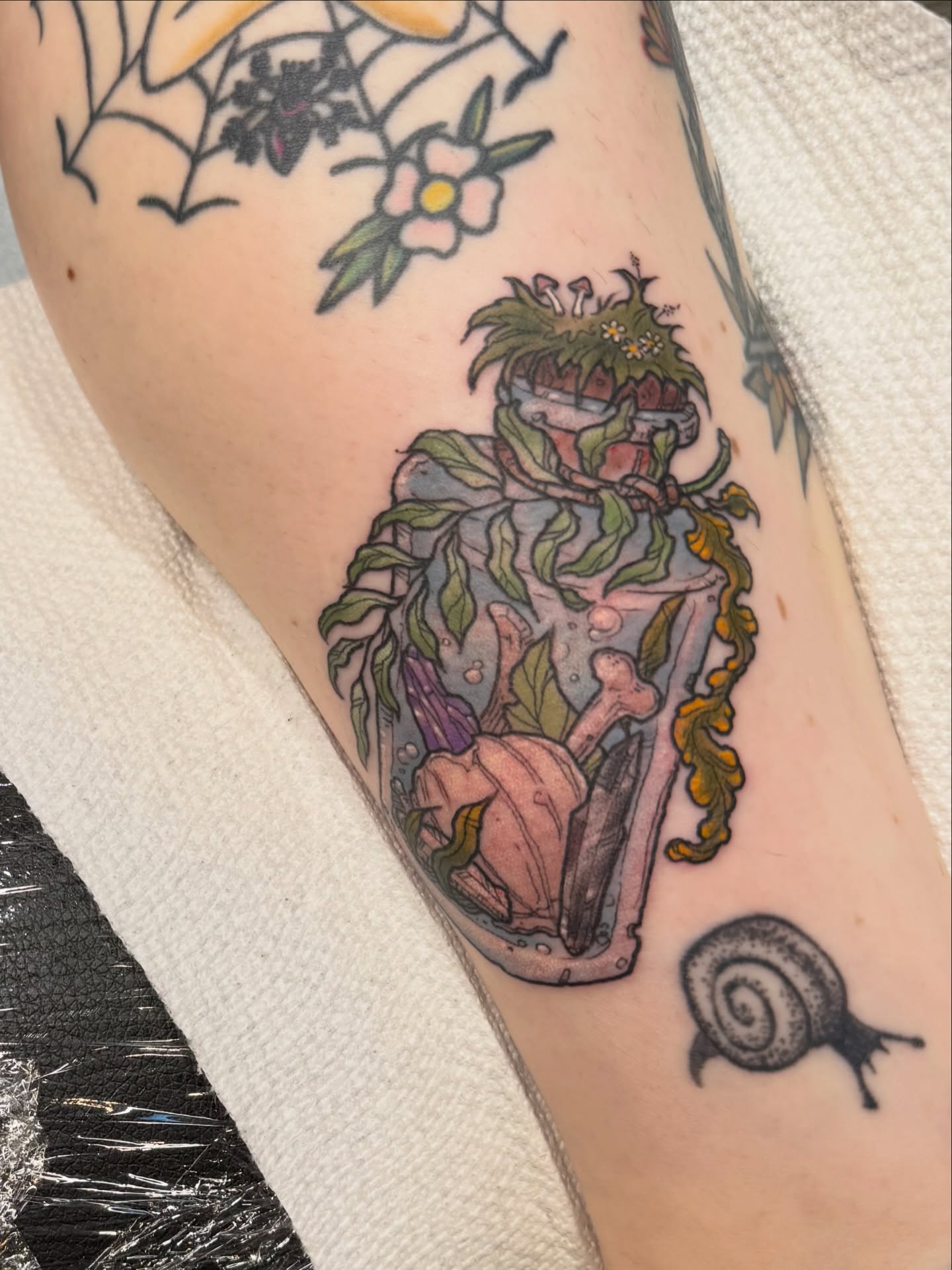 Plant and skull dotwork tattoo on the forearm by Rebeka Chase [Sobodacha]
