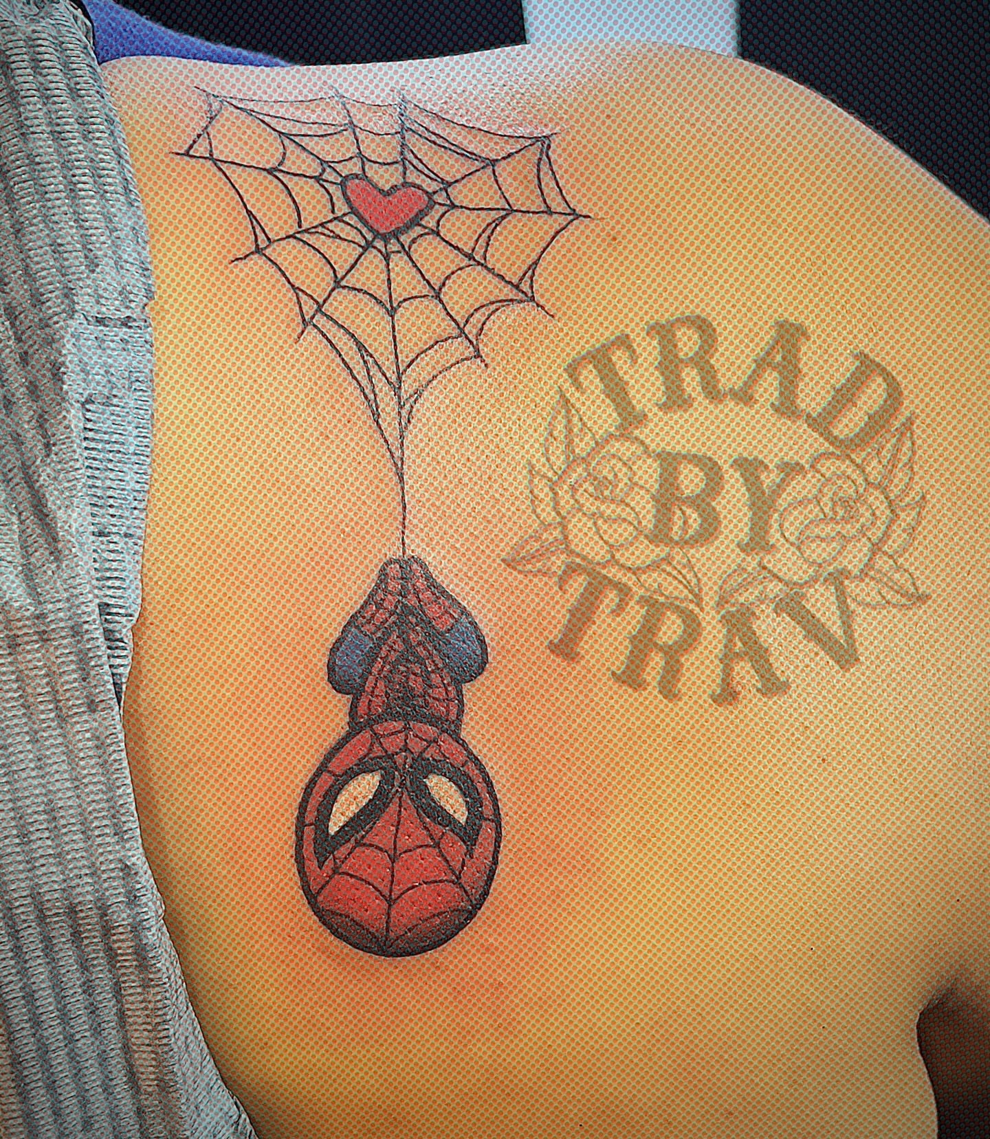 Spiderman mask American traditional tattoo on the back by Travis B