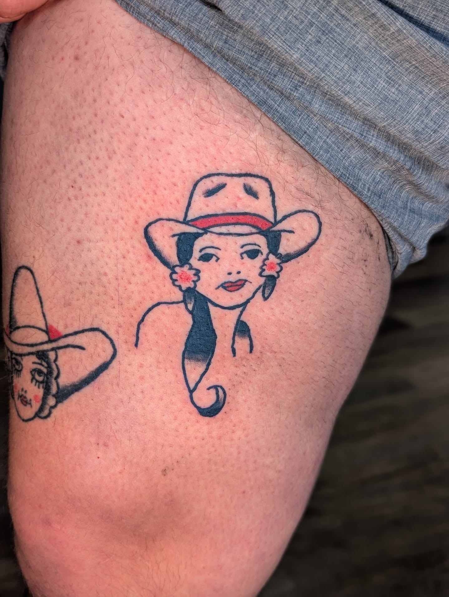 Woman wearing sombrero American traditional tattoo on the thigh by Jon Sedor