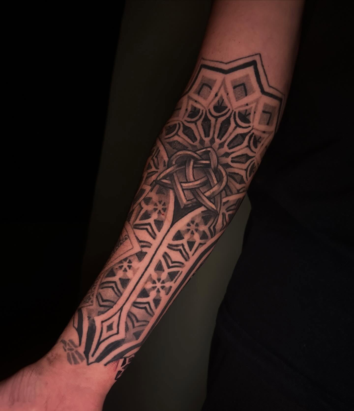 Geometric pattern geometric tattoo on the forearm by Javier Rivera