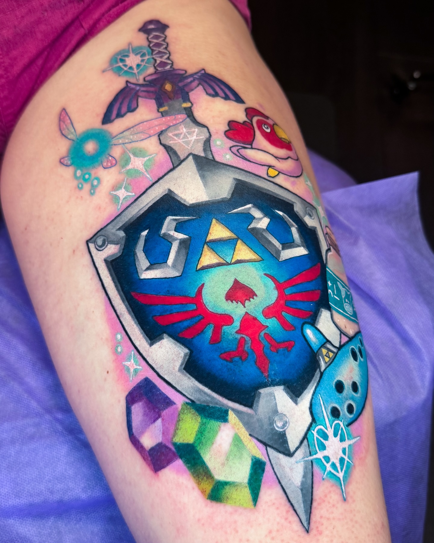 Zelda shield new school tattoo on the thigh by 𝔐𝔞𝔯𝔰 ✨
