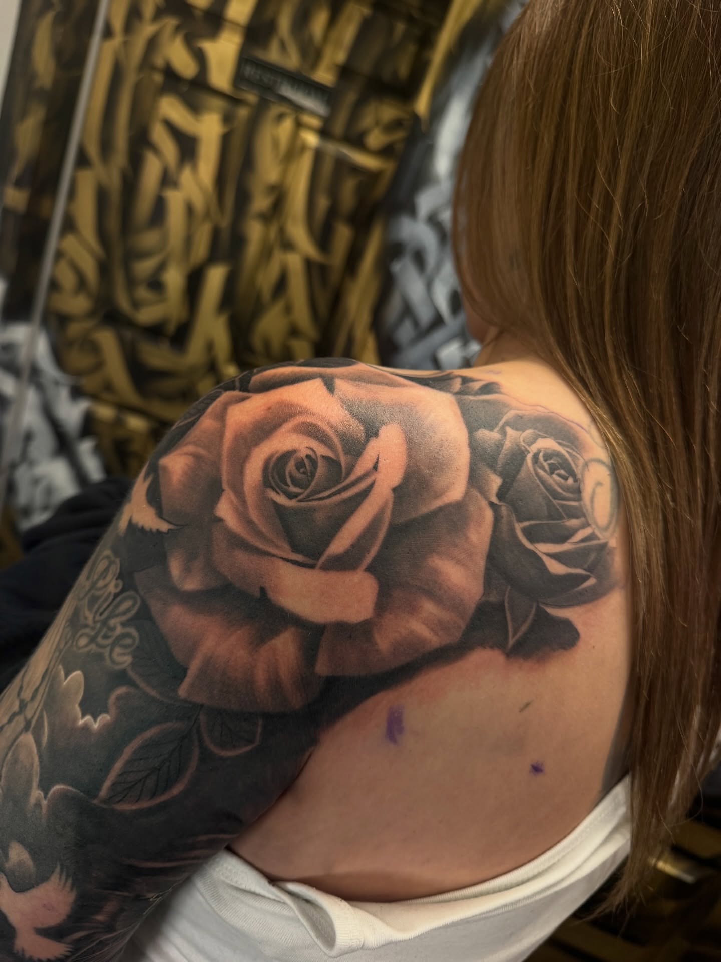 Roses realism tattoo on the shoulder by Fernando Luna