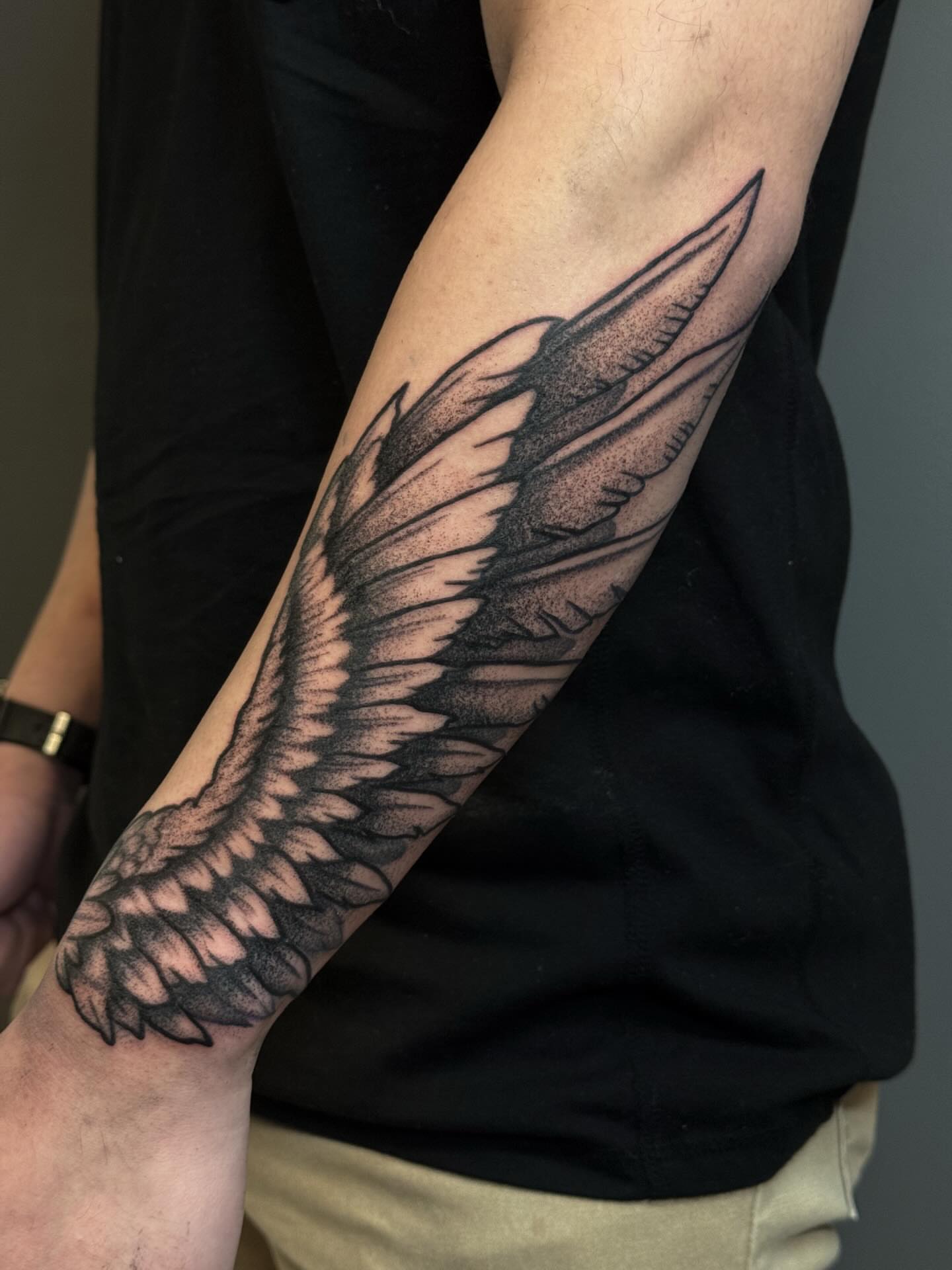 Wing dotwork tattoo on the forearm by Sebastián Vallejo