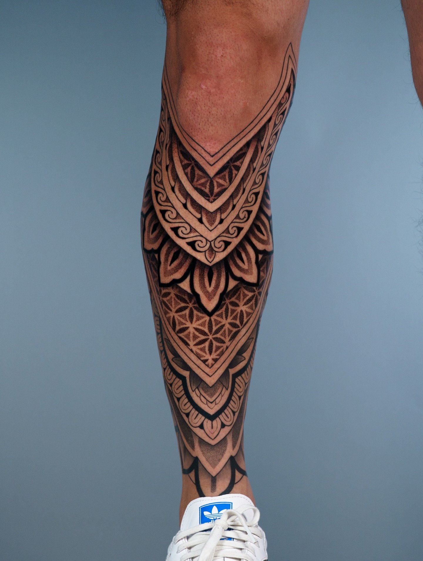 Tribal pattern tribal tattoo on the calf by Jason Call