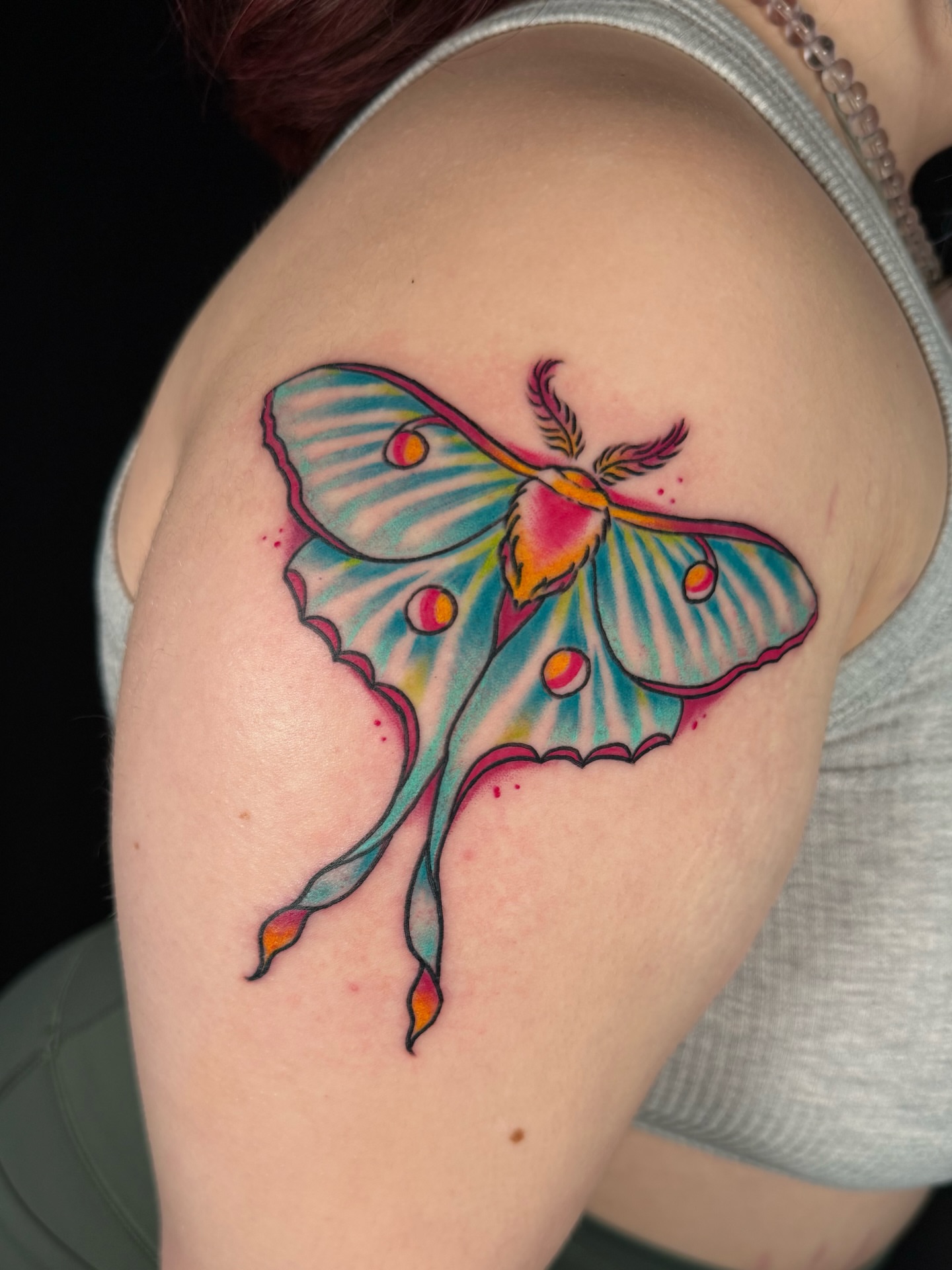 Moth watercolor tattoo on the shoulder by Chelsea Graham, Seattle, Washington