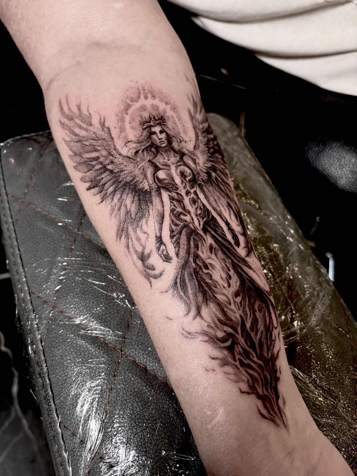 Angelic figure realism tattoo on the forearm by Barbara Gonzalez