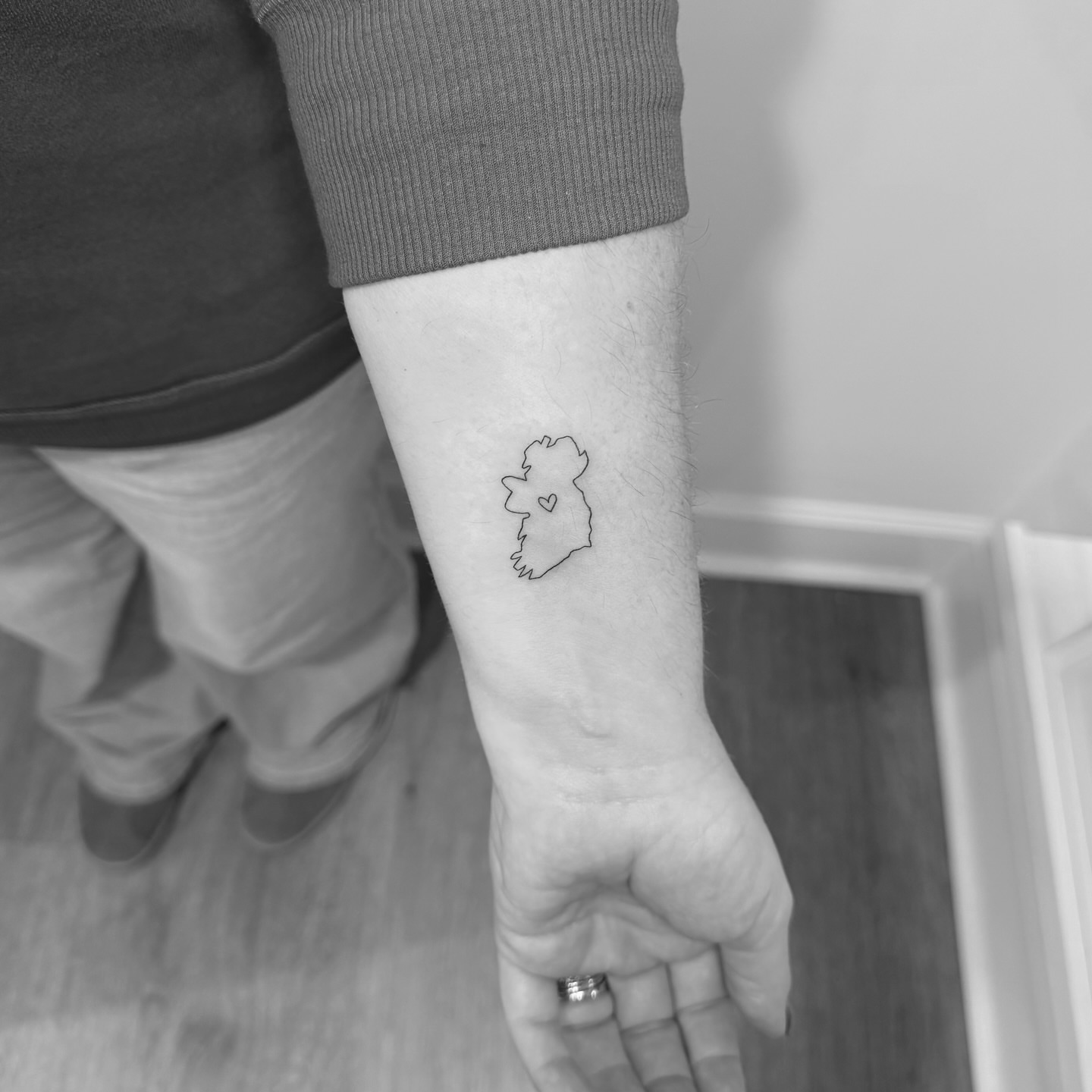 Ireland map fine line tattoo on the forearm by Jessica, Cheektowaga, New York