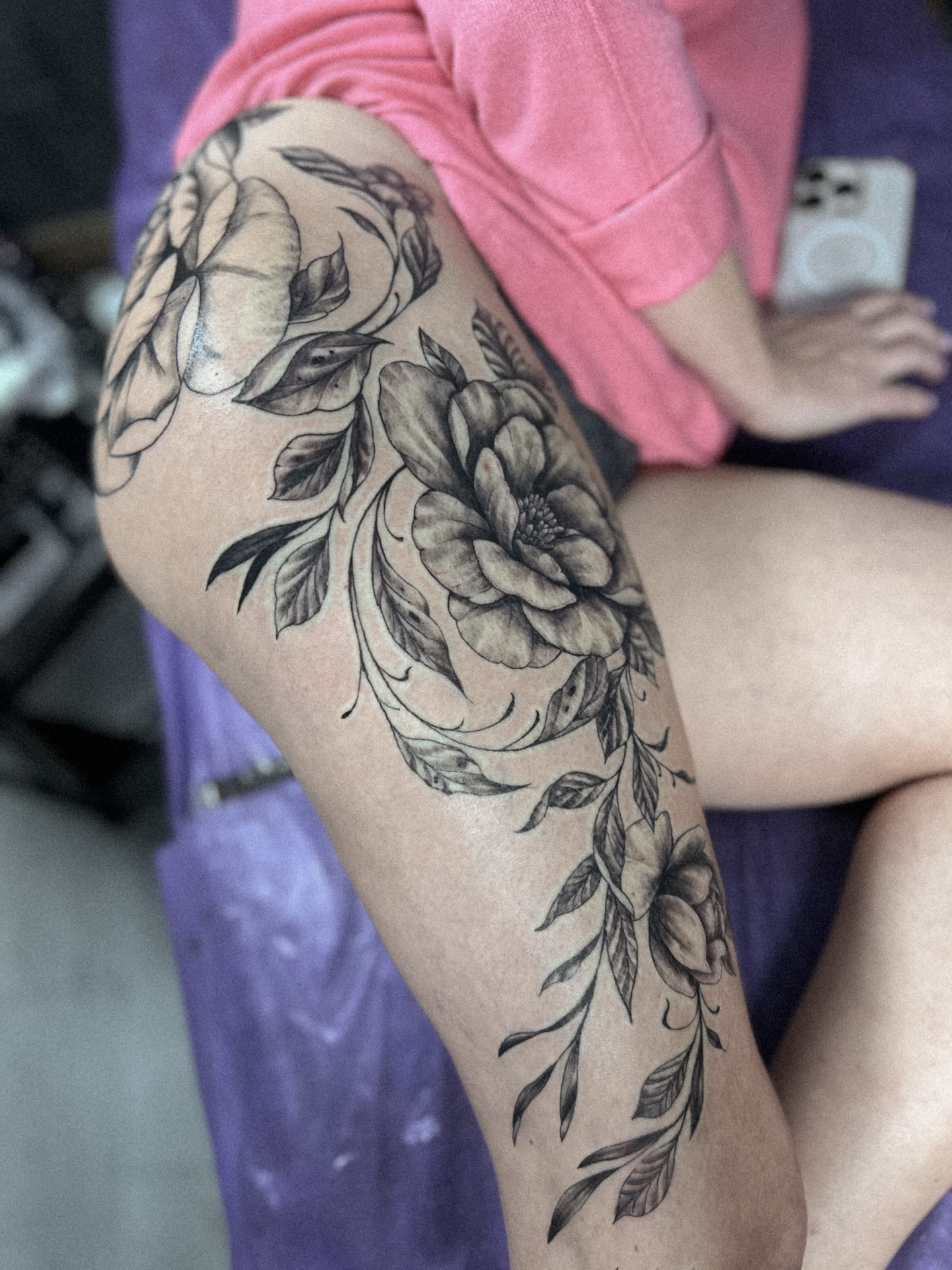 Floral design black and grey tattoo on the thigh by Asap tattoo