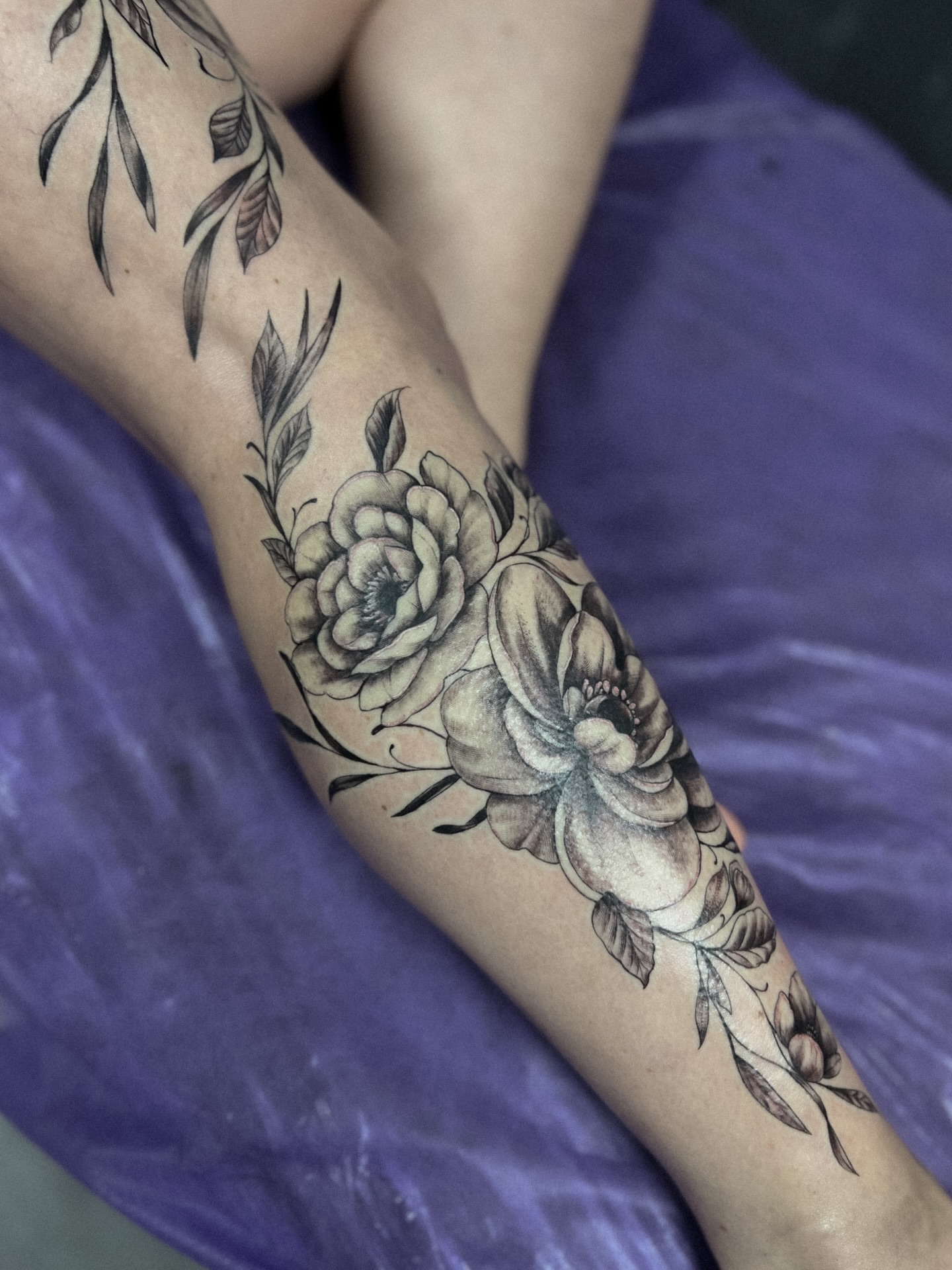 Floral bouquet black and grey tattoo on the forearm by Asap tattoo