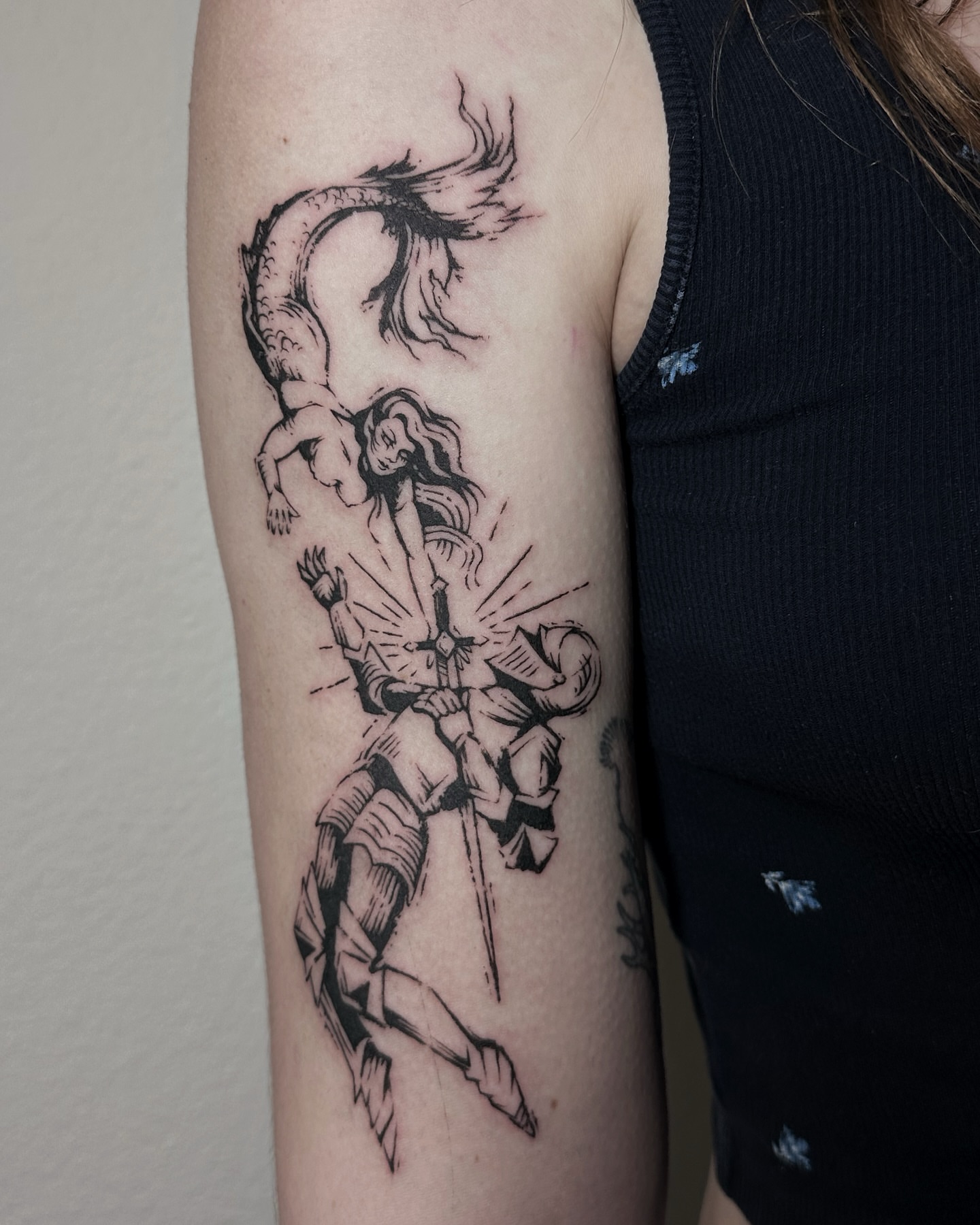 Sword-wielding warrior realism tattoo on the forearm by Micky, Austin, Texas