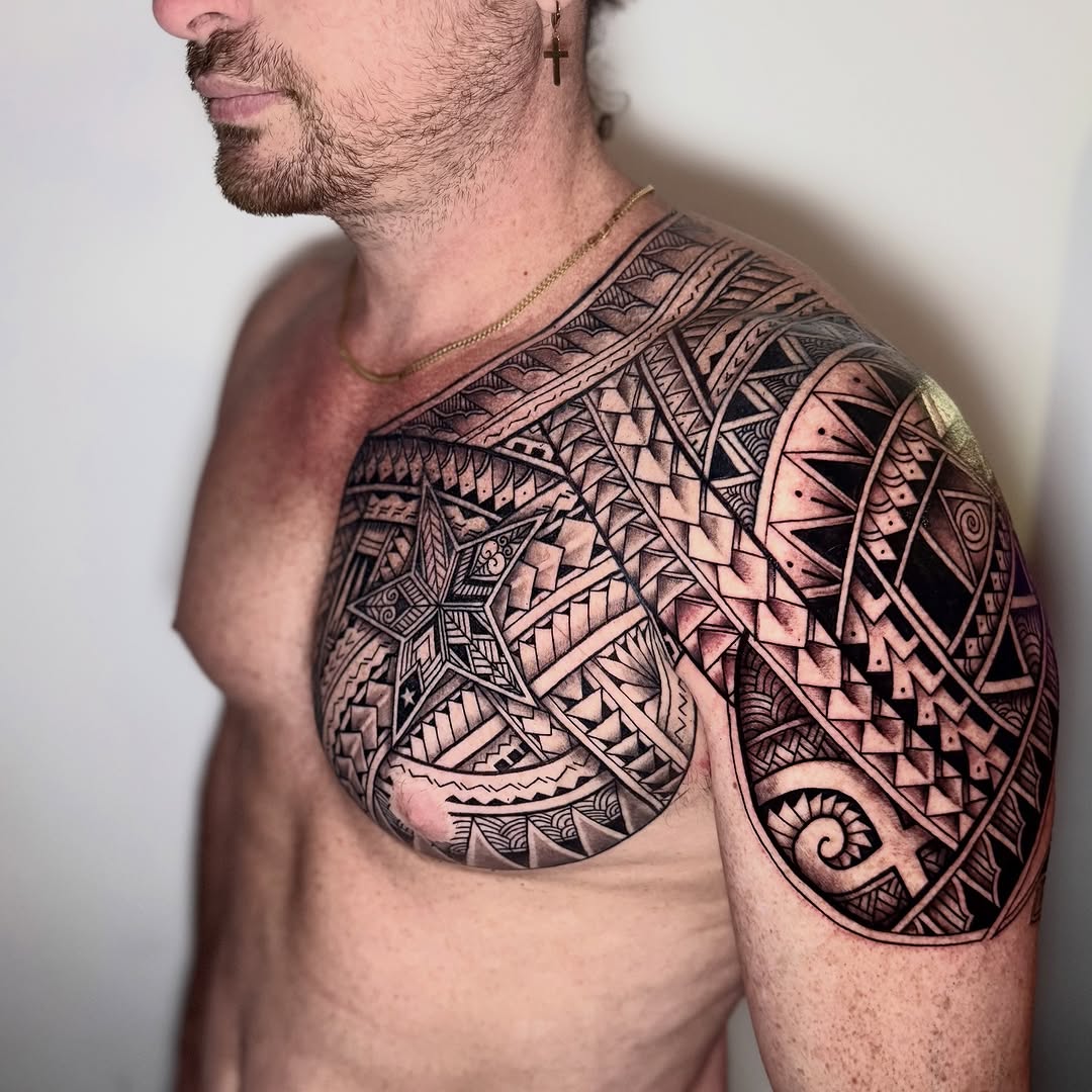 Maori tribal chest and shoulder piece tribal tattoo on the chest by Ivy lee