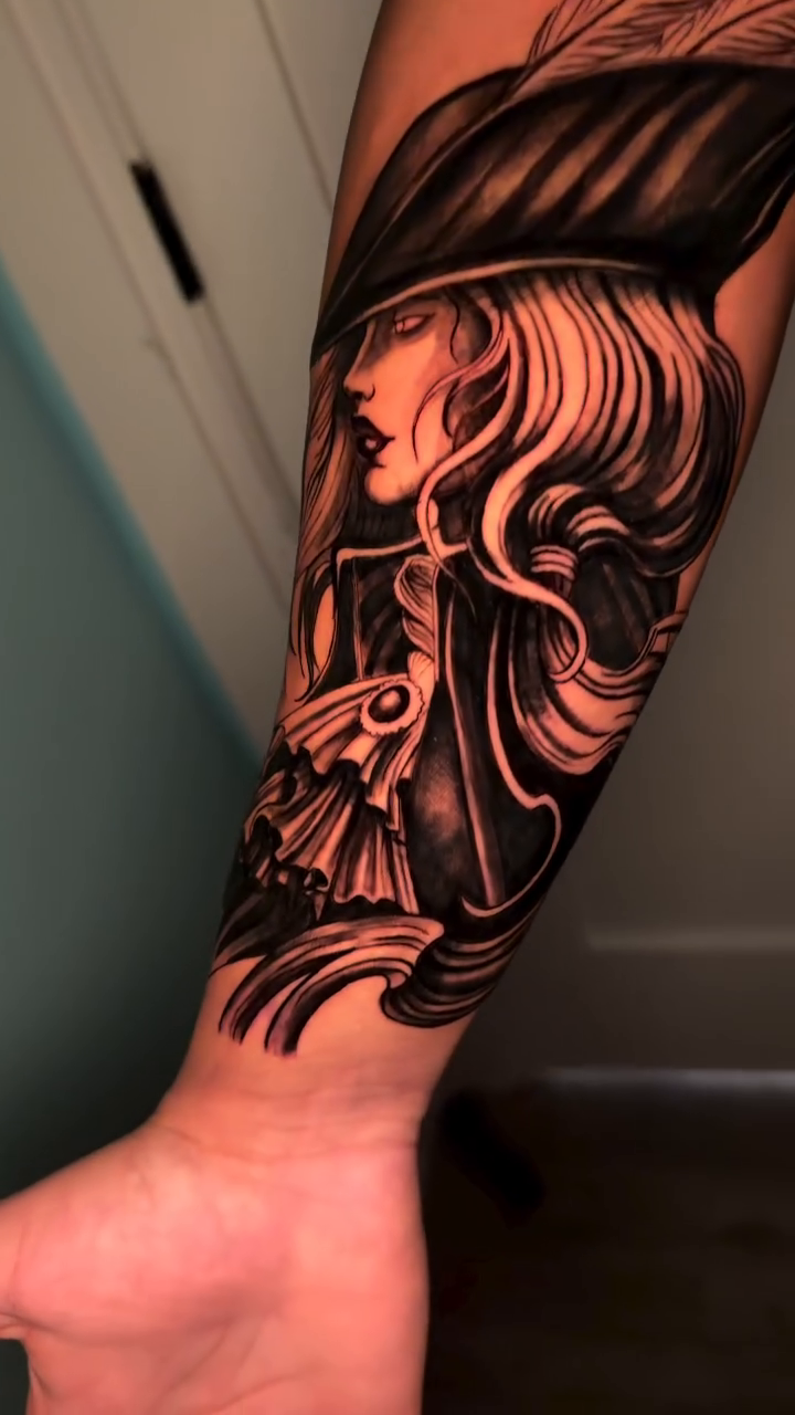Woman in hat realism tattoo by Gage Cottrell