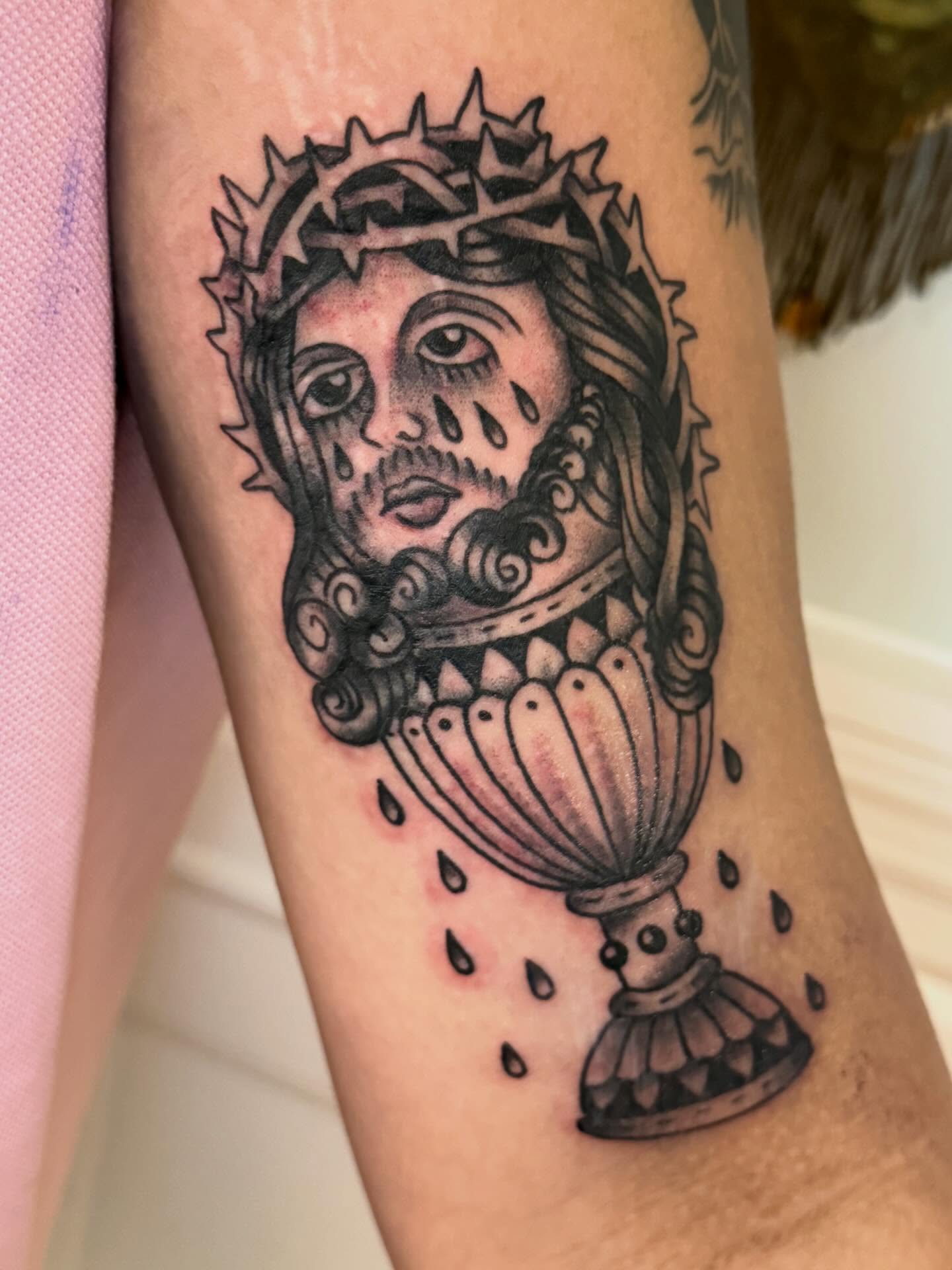 Religious iconography black and grey tattoo on the forearm by Jesse Boss, Nashville, Tennessee