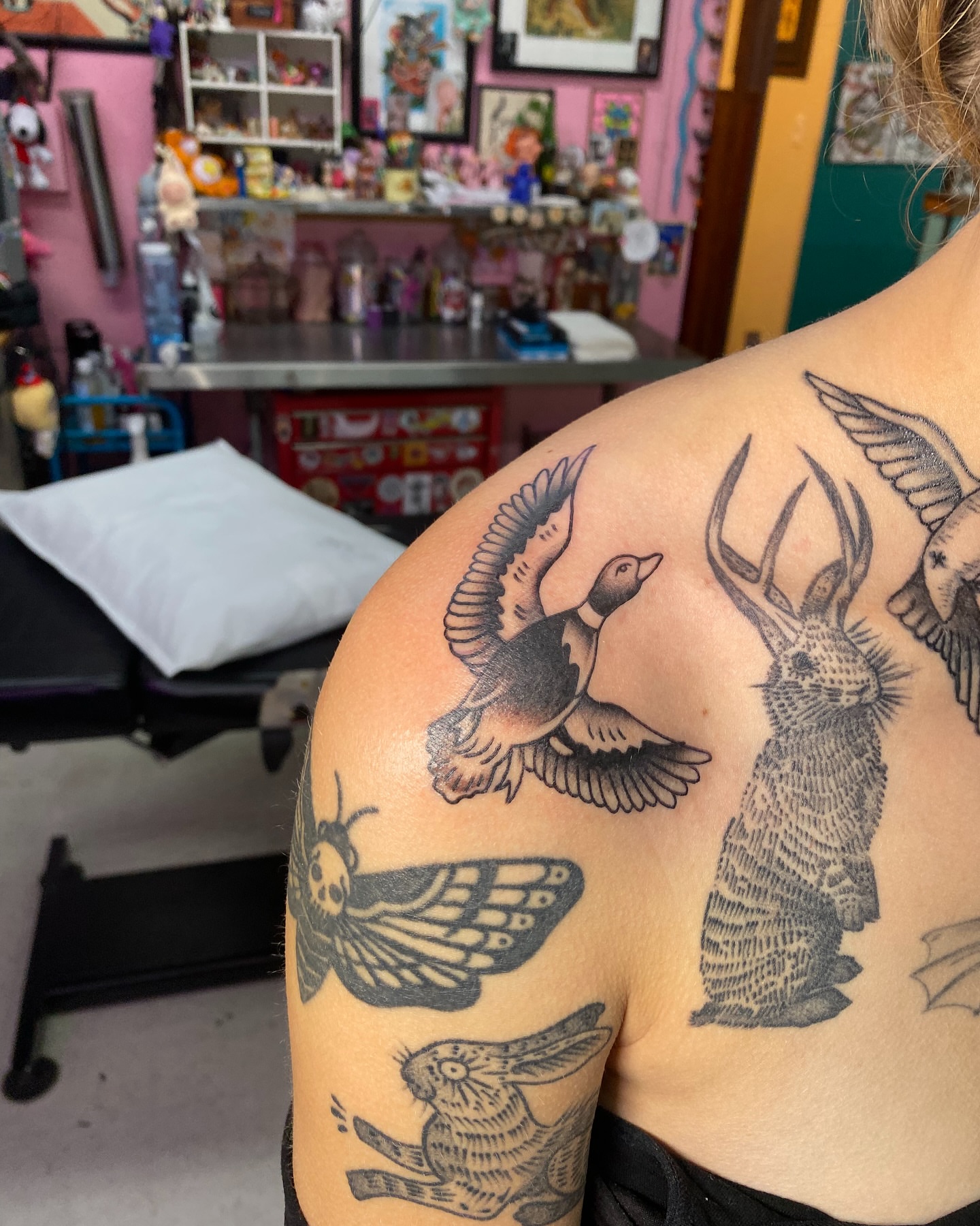 Bird and rabbit black and grey tattoo on the shoulder by Ramsie Segura-Andrews