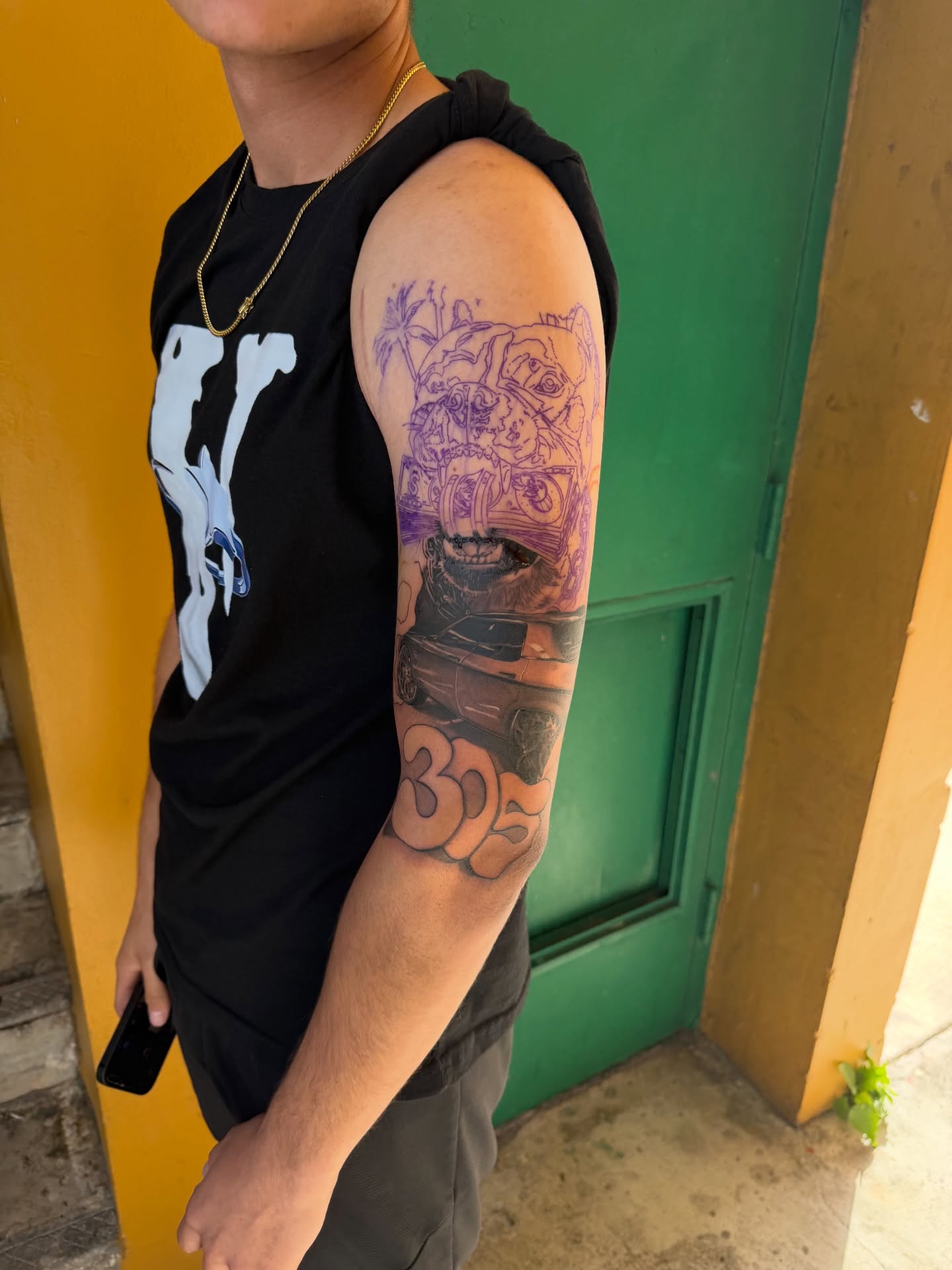 Motorcycle and rider American traditional tattoo on the forearm by Lemaih Gonzalez