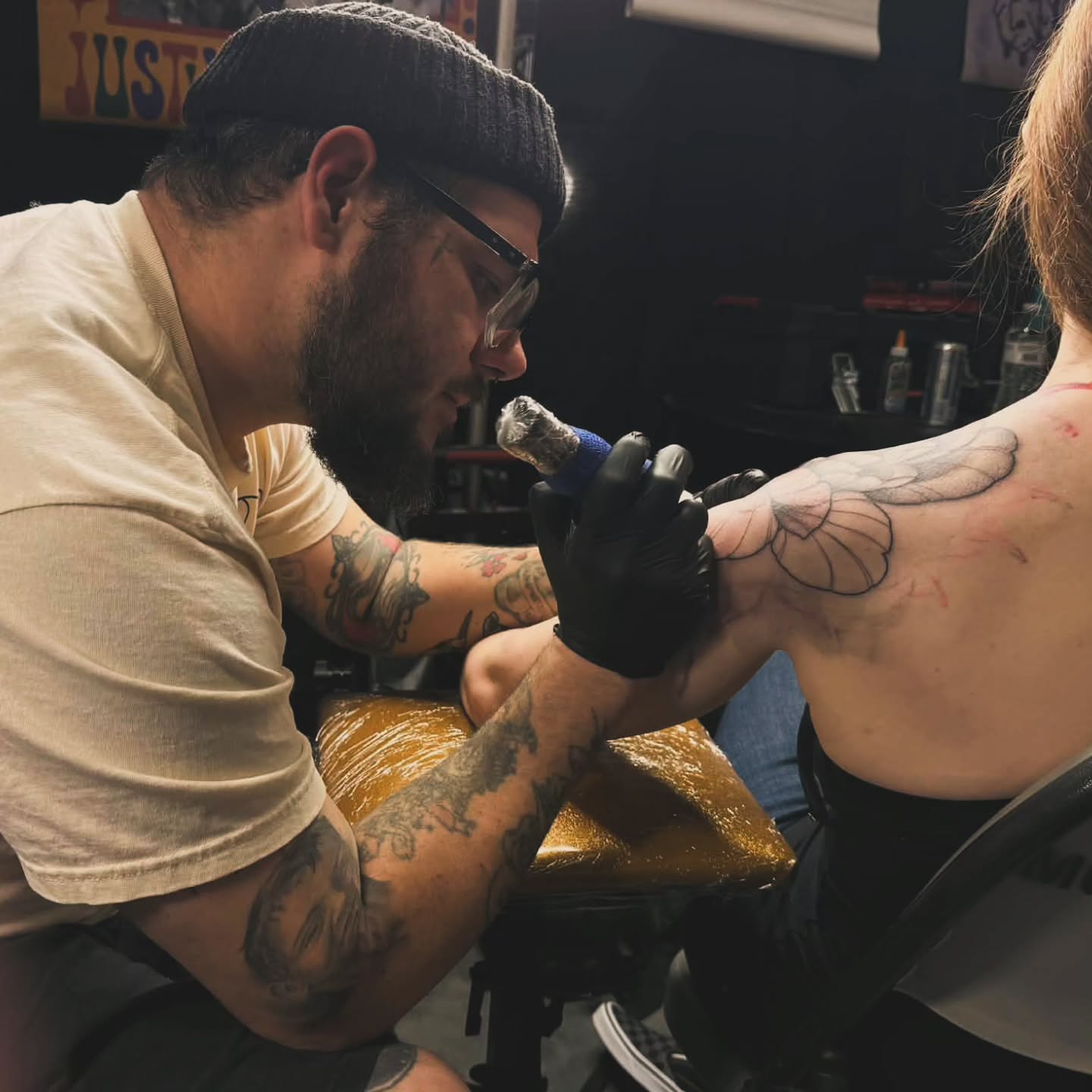 Wing neo-traditional tattoo on the shoulder by Justin Eldridge