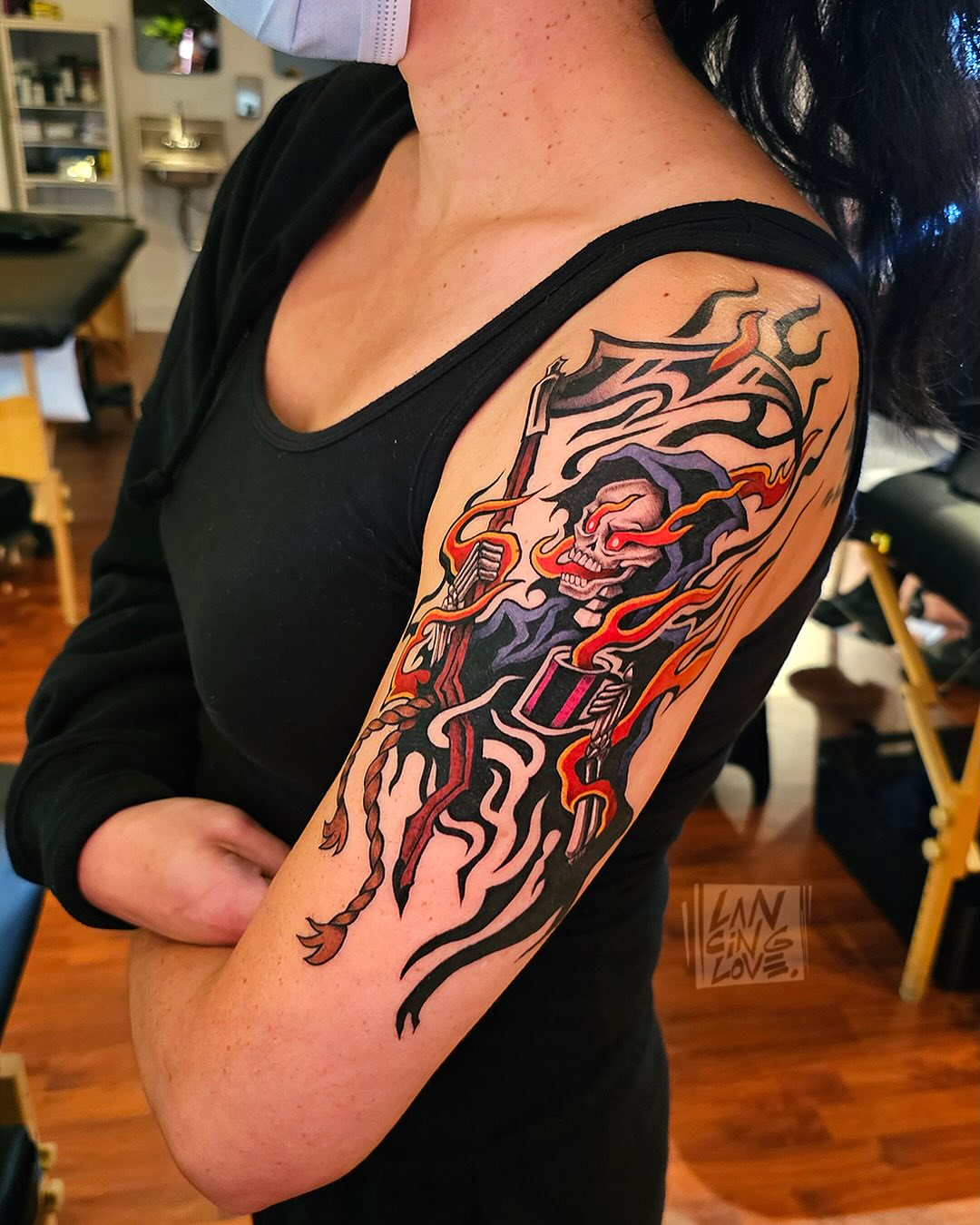 Reaper with scythe American traditional tattoo on the upper arm by Lancinglove