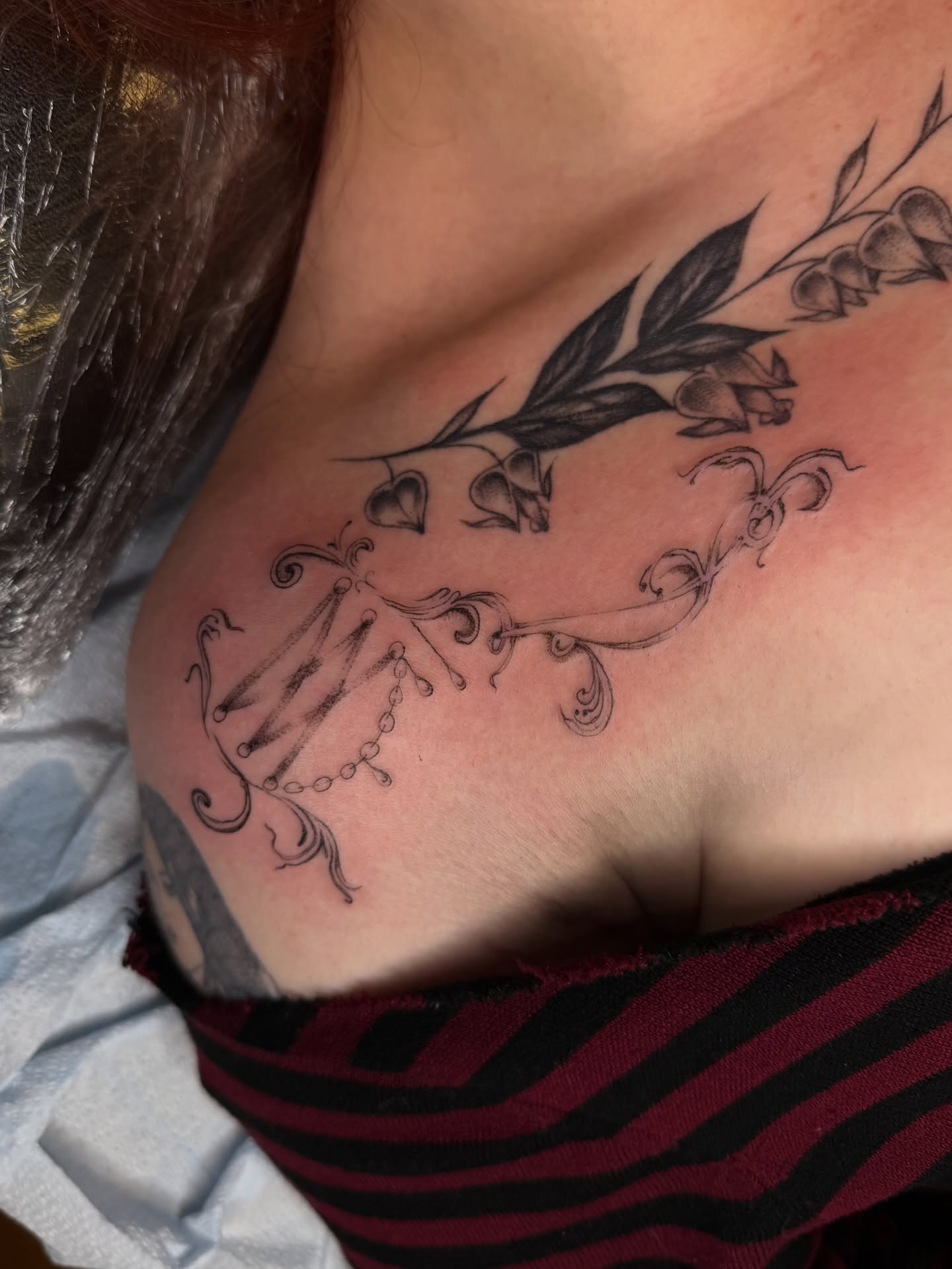 Floral vine ornamental tattoo on the shoulder by Maddie Blosser, Portland, Oregon