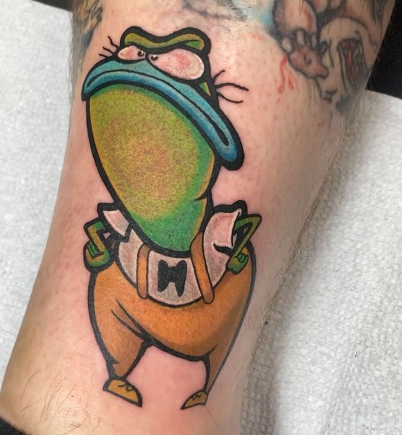 Frog American traditional tattoo on the forearm by Shelby