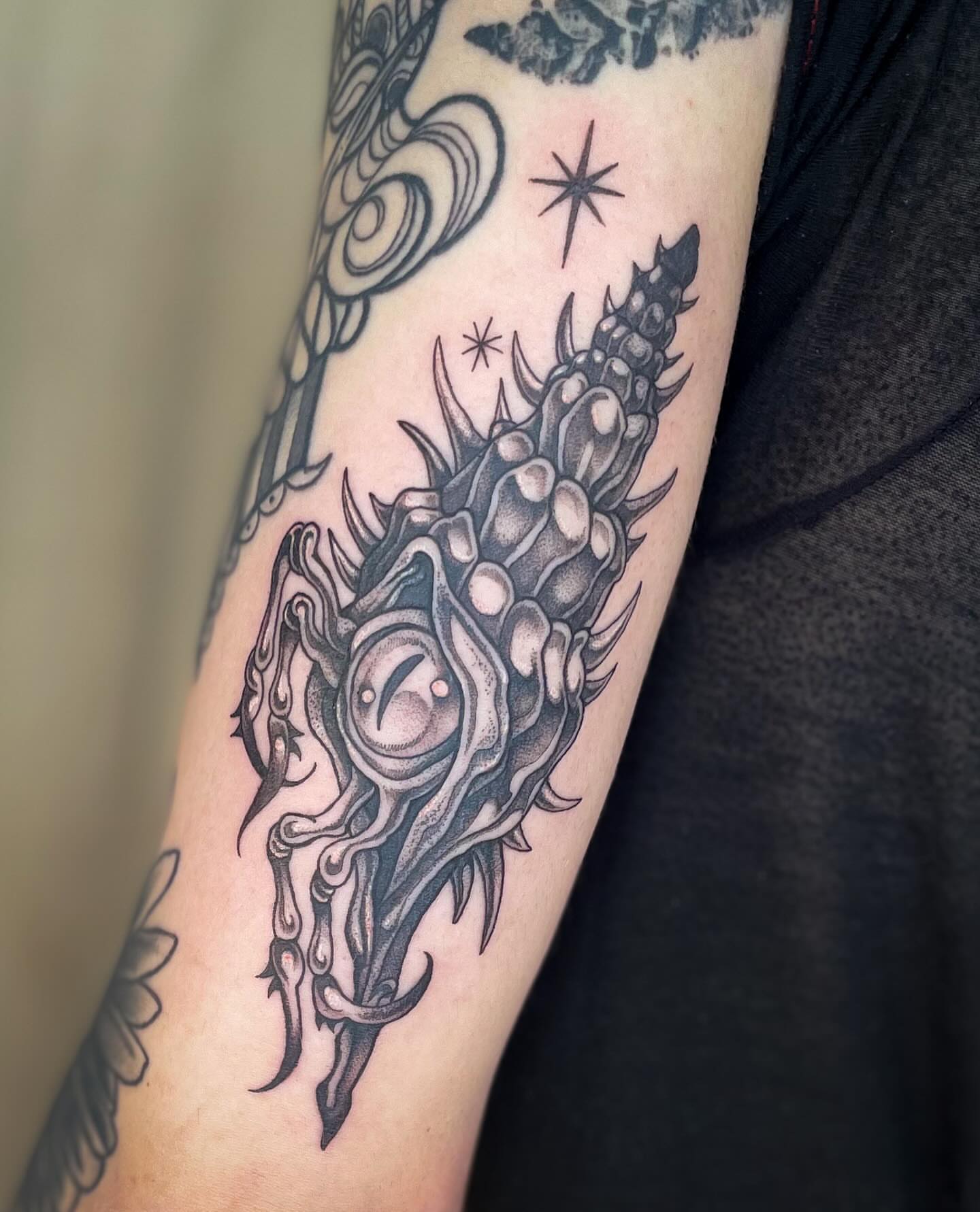Shell black and grey tattoo on the forearm by 𝖂𝖍𝖆𝖙𝕽𝖊𝖎𝖑𝖊𝖞