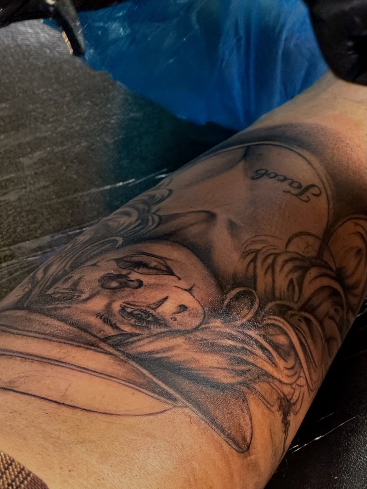 Woman with flowing hair black and grey tattoo on the forearm by Tanner Pastor