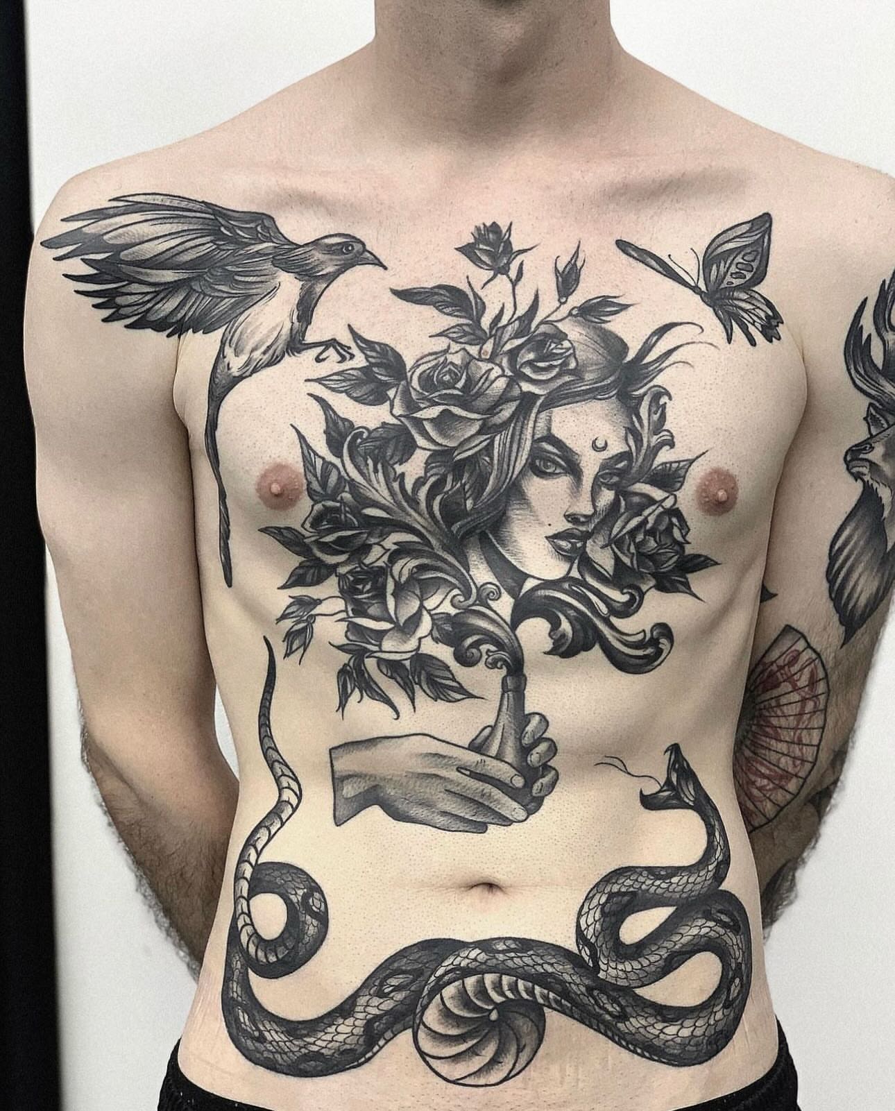 Woman with roses realism tattoo on the chest by Elvira Savchuk