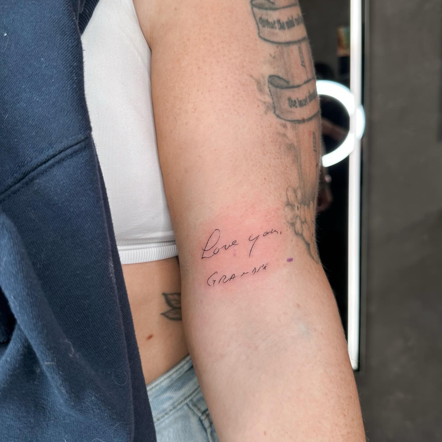 Tattoo by @livlaughtats — lettering_script