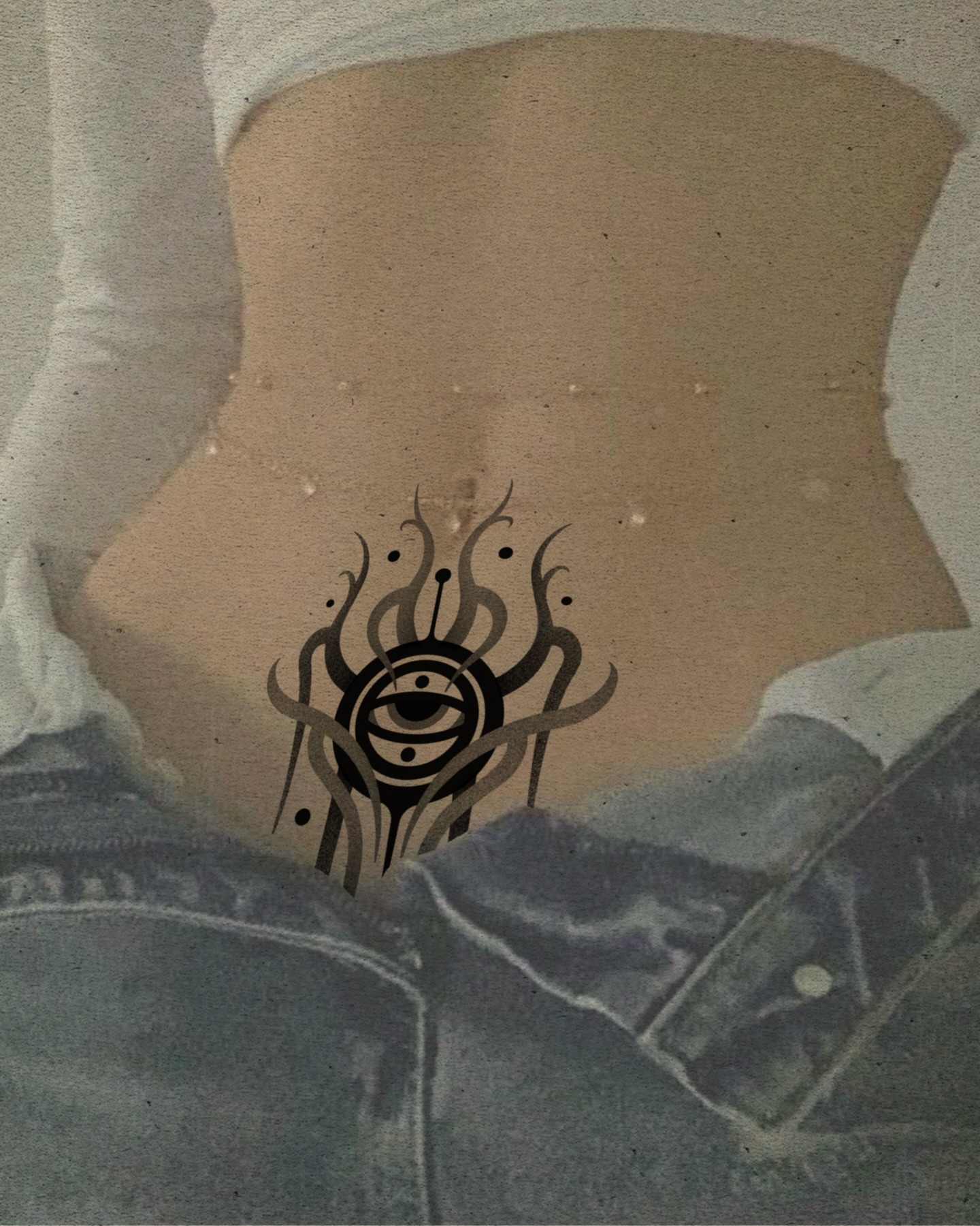 Eye with tribal design tribal tattoo on the torso by Fisher Man