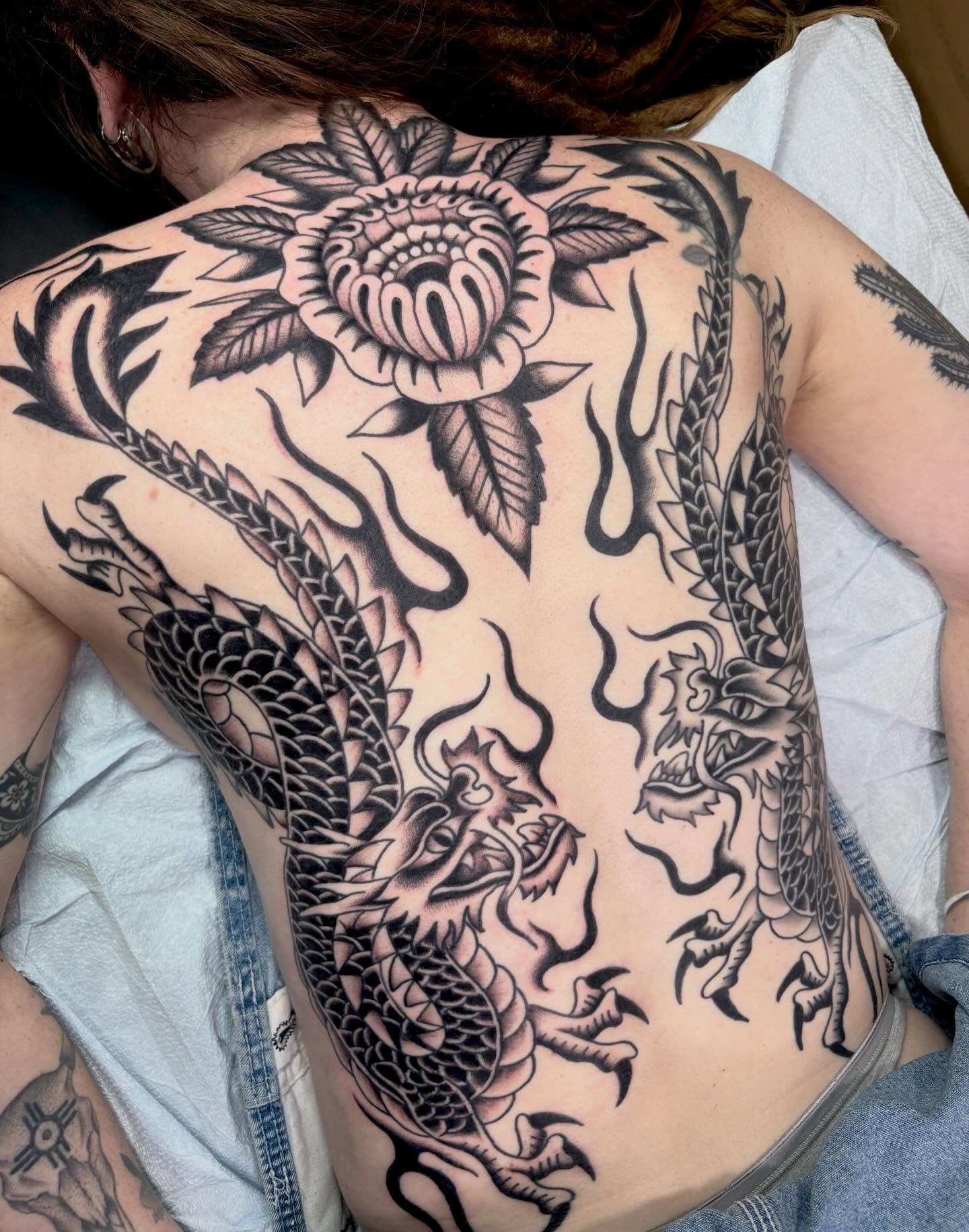 Dragon and lotus American traditional tattoo on the back by sally ★ lee