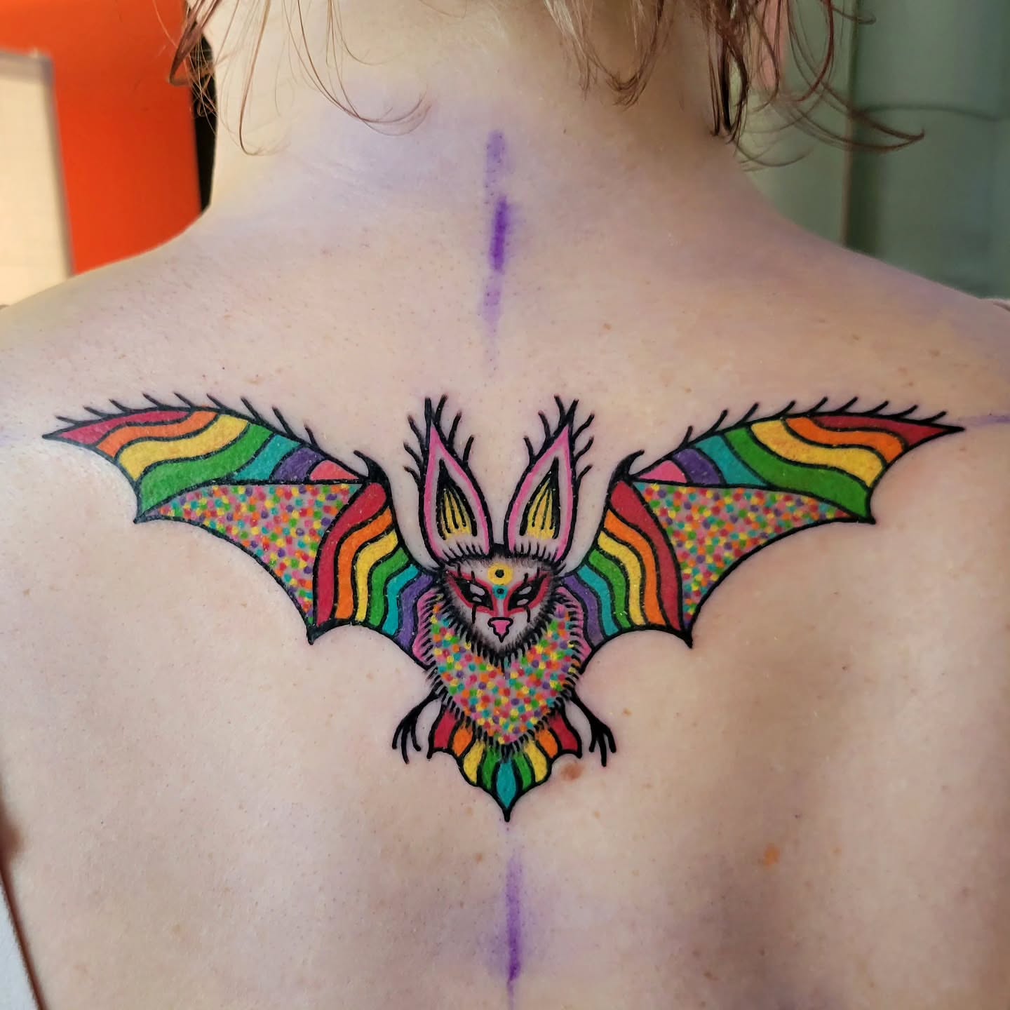 Bat dotwork tattoo on the back by Cat Wong意藝