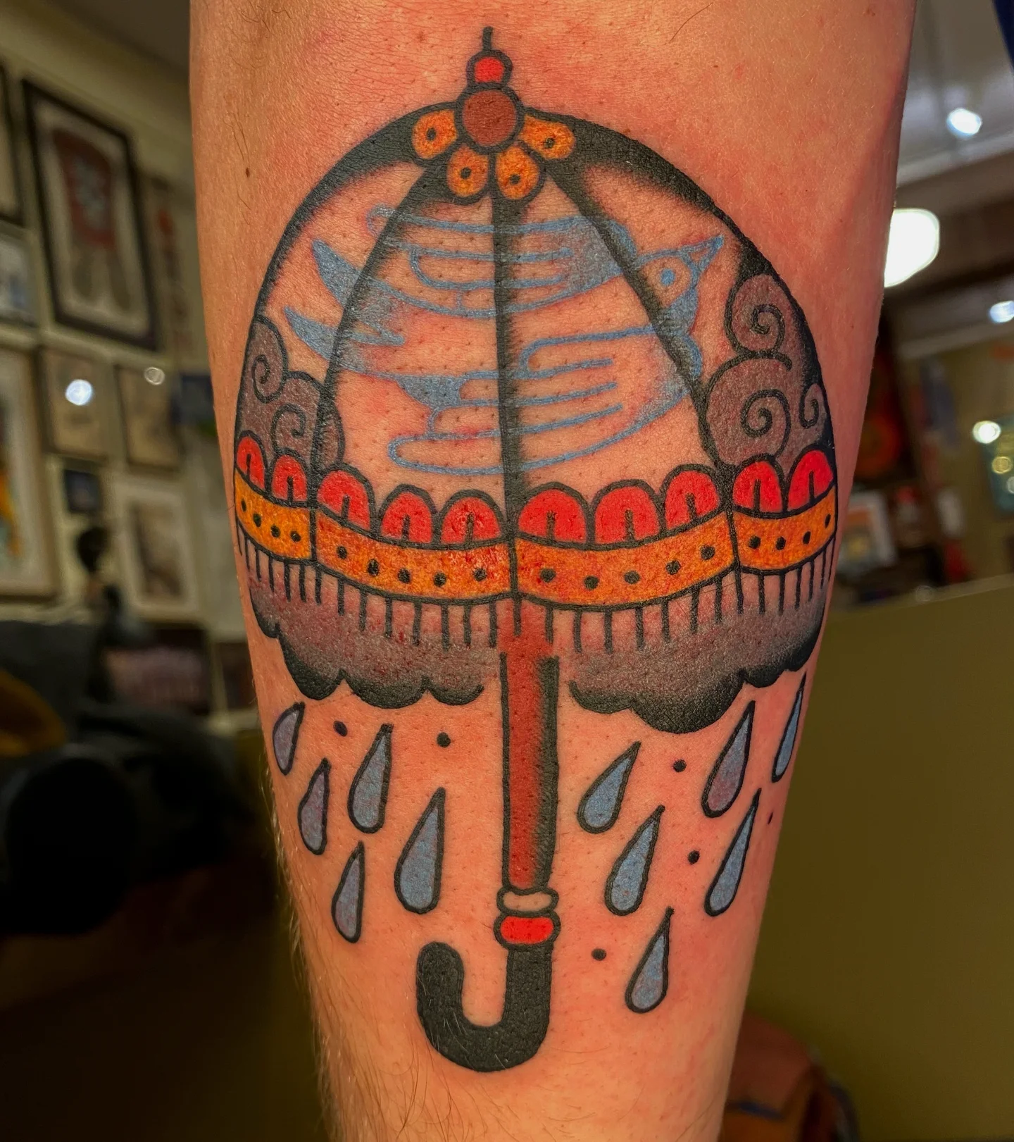 Umbrella American traditional tattoo on the forearm by Quinn, Kansas City, Missouri