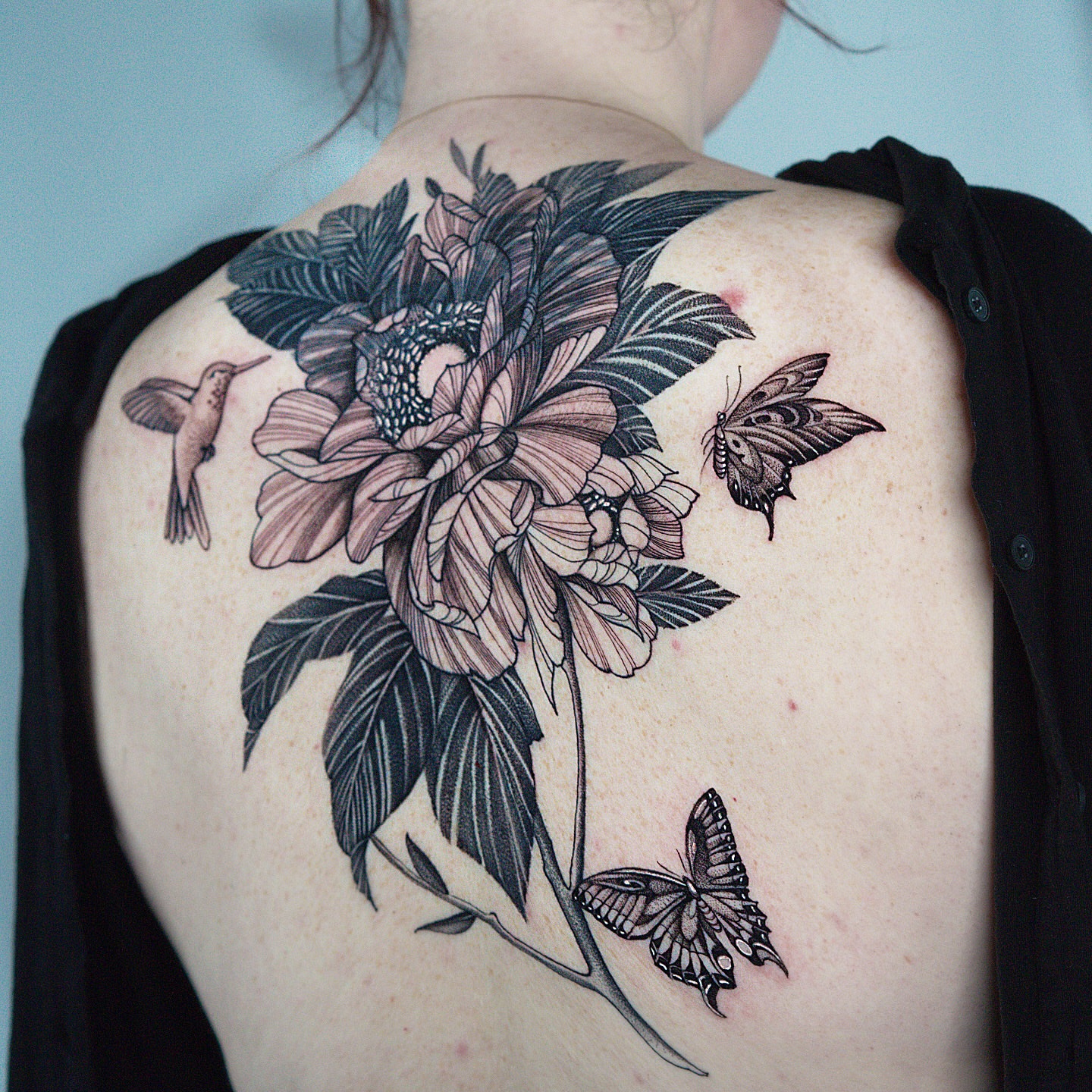 Flower and butterflies realism tattoo on the back by H I R A  L U P E - tattoo artist, Oakland, California