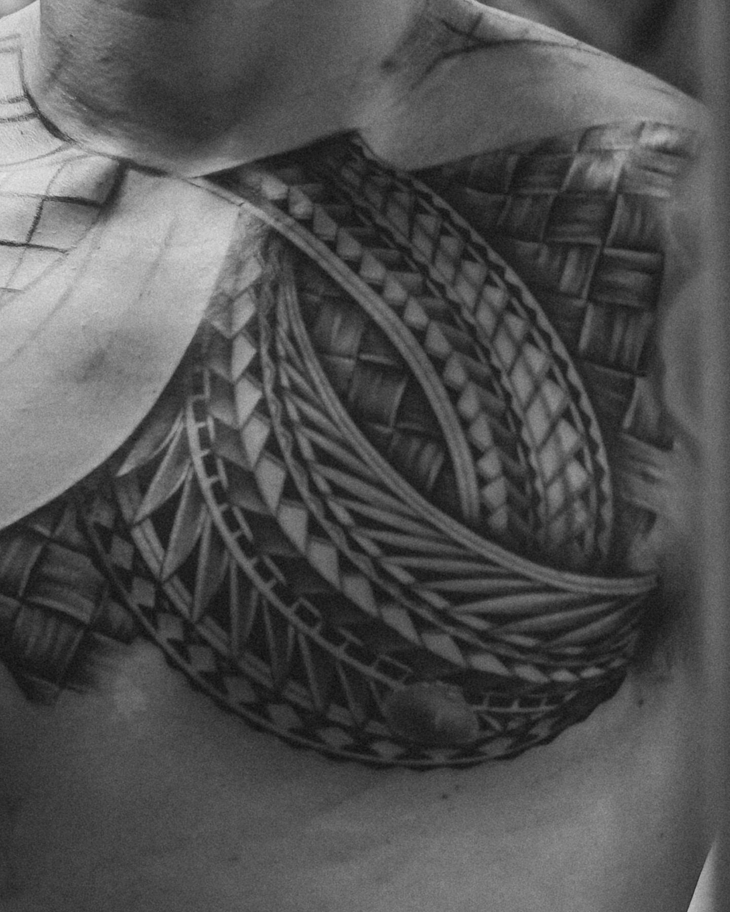 Geometric pattern geometric tattoo on the chest by TATTOOS by DESMOND