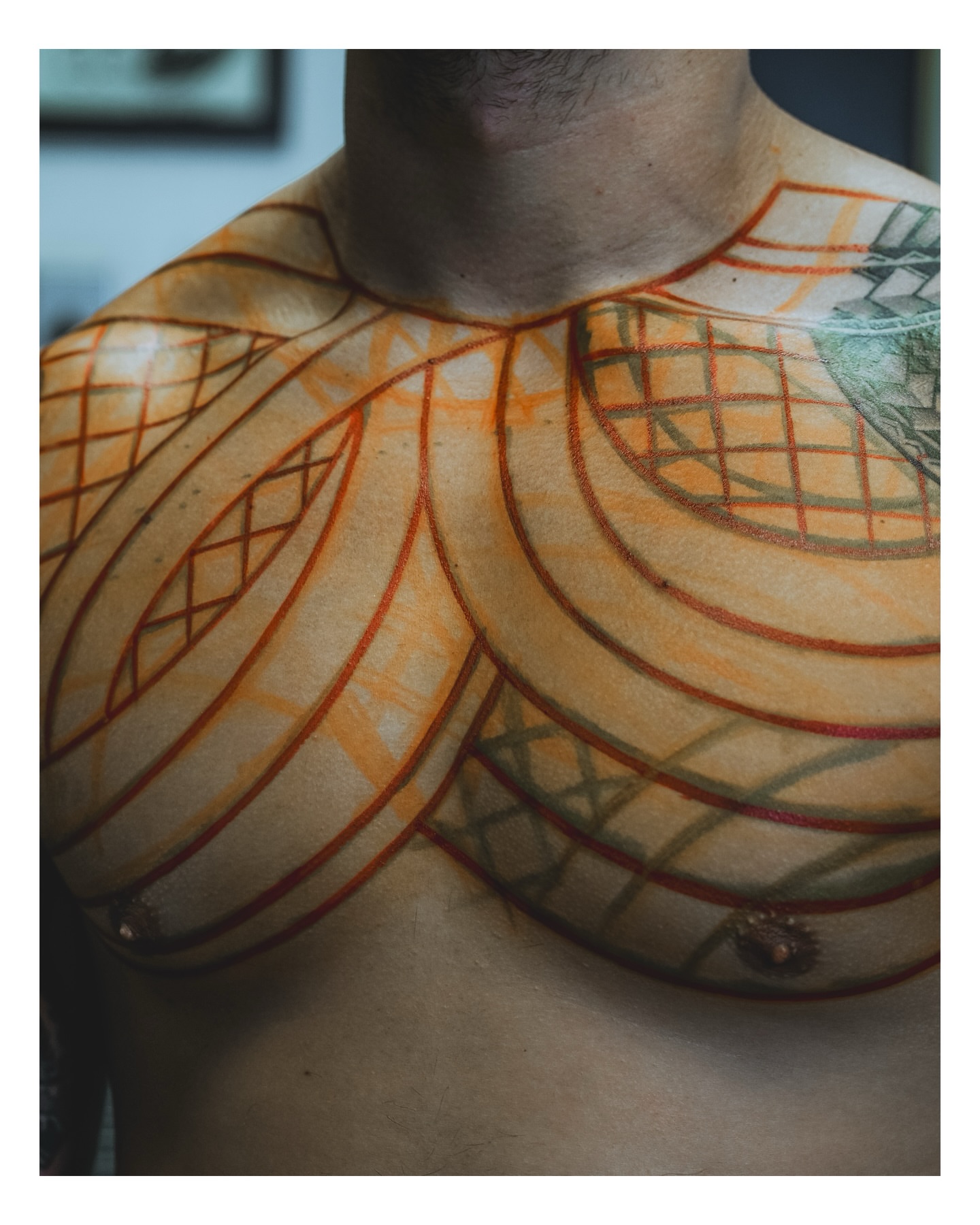 Geometric pattern geometric tattoo on the chest by TATTOOS by DESMOND