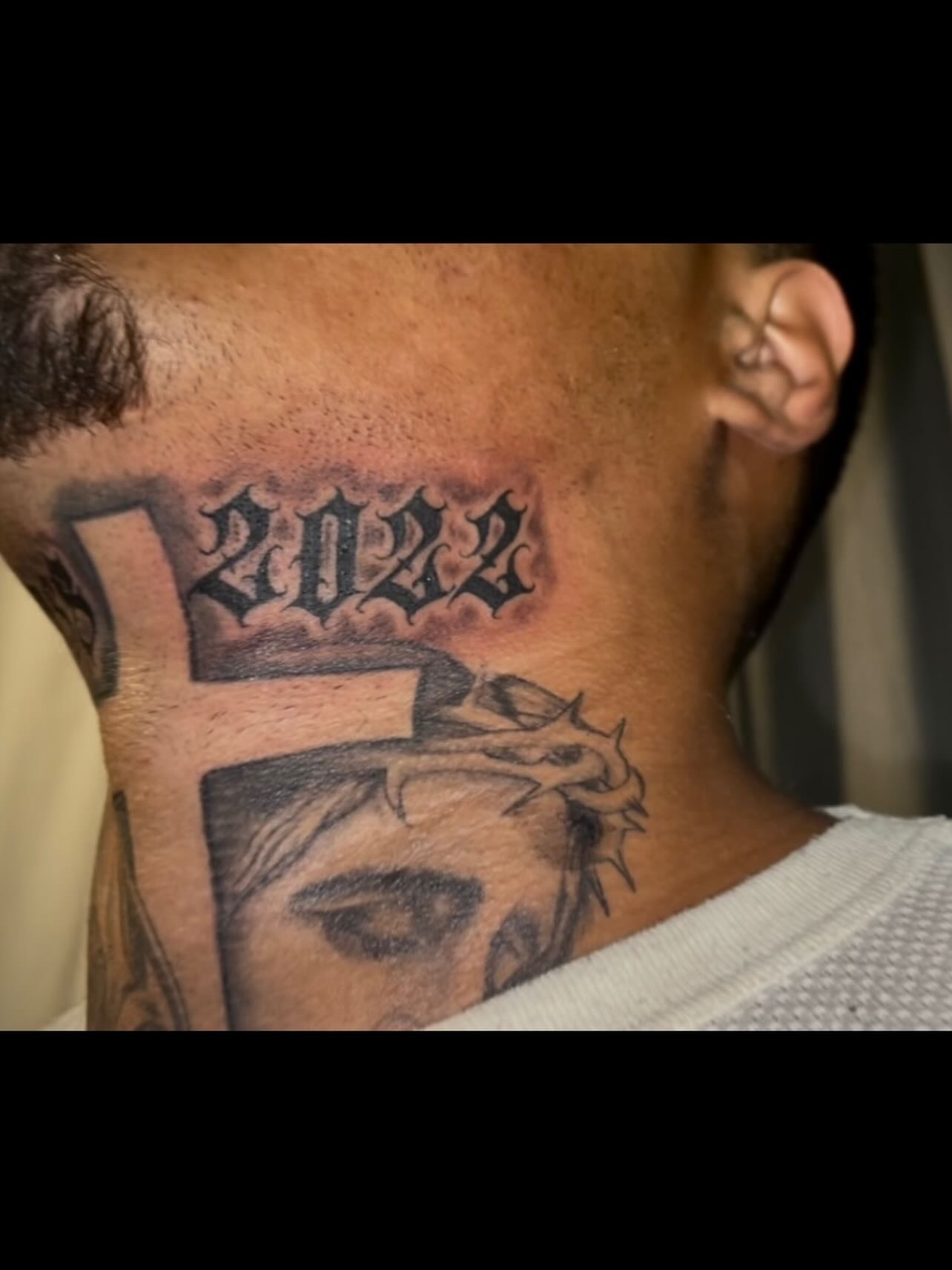 2022 black and grey tattoo on the neck by Tu SanchoTattoos