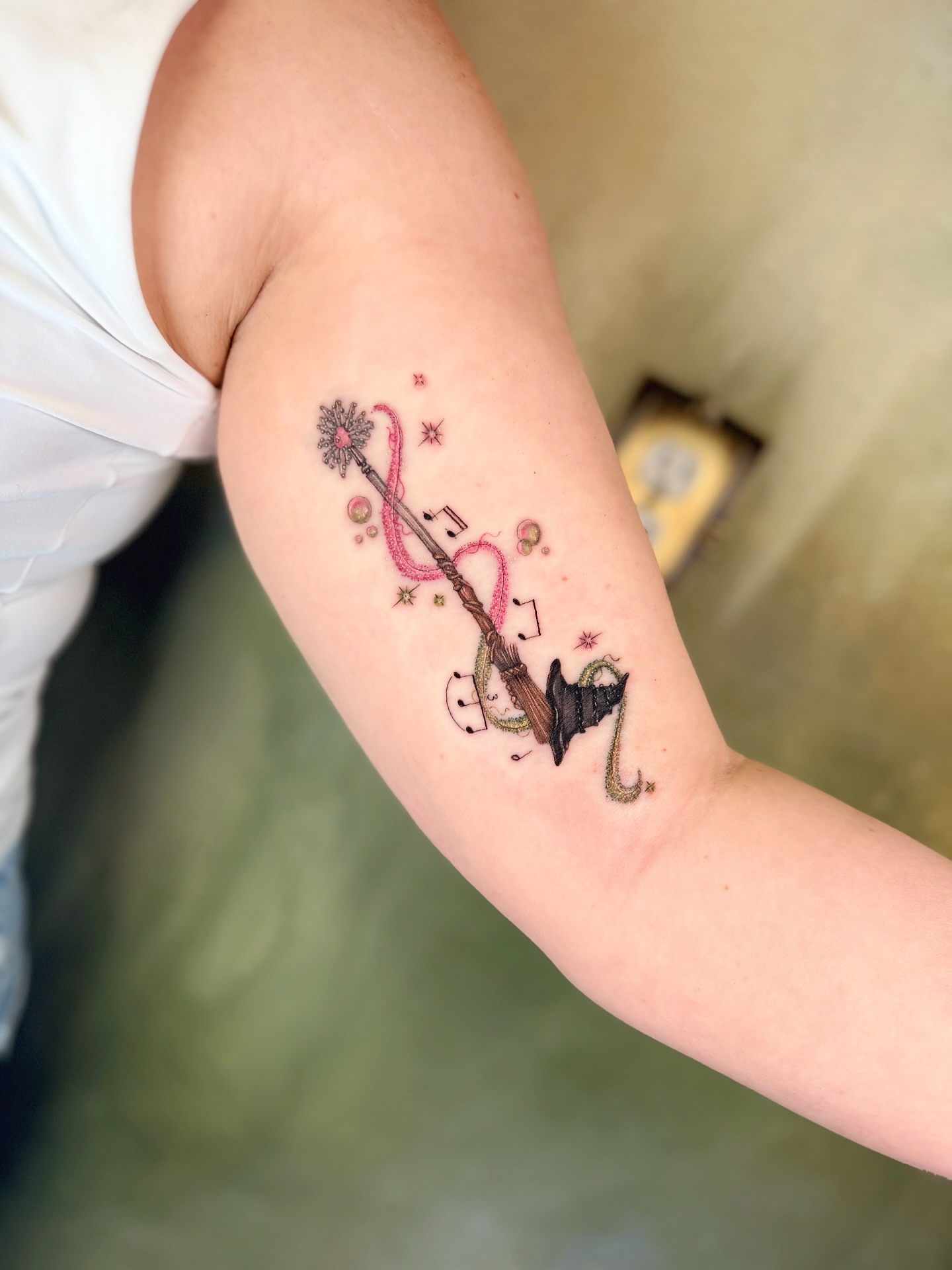 Magic wand new school tattoo on the forearm by Natasha Rachel Fineline Tattoos Nashville