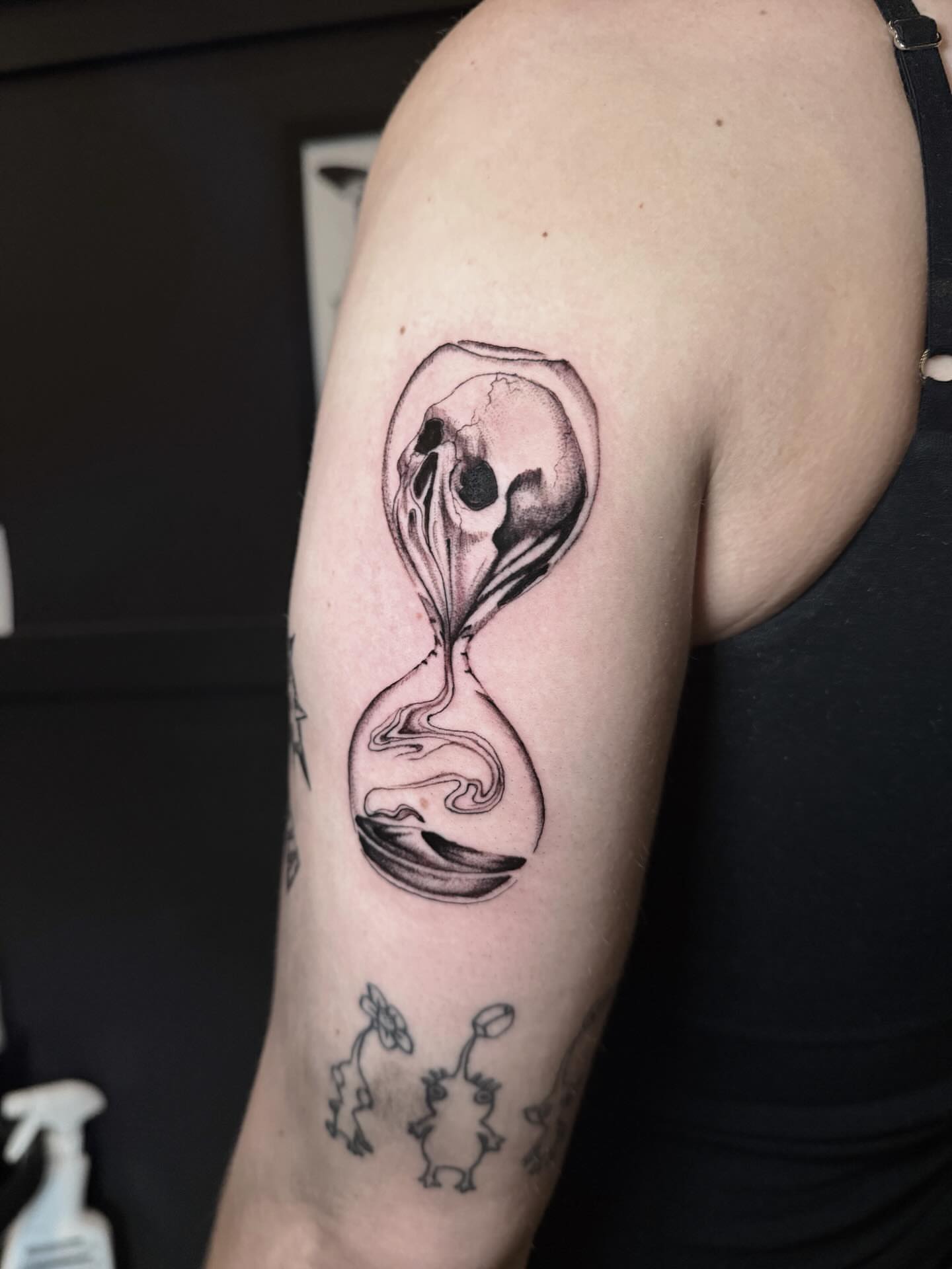 Hourglass black and grey tattoo on the forearm by Jess, Midvale, Utah