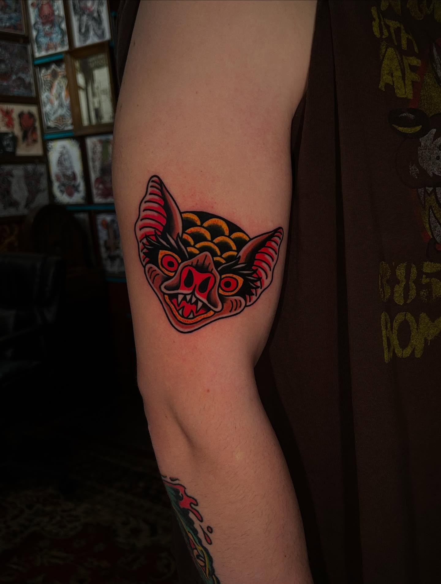 Bat American traditional tattoo on the forearm by Lexi Kniskern