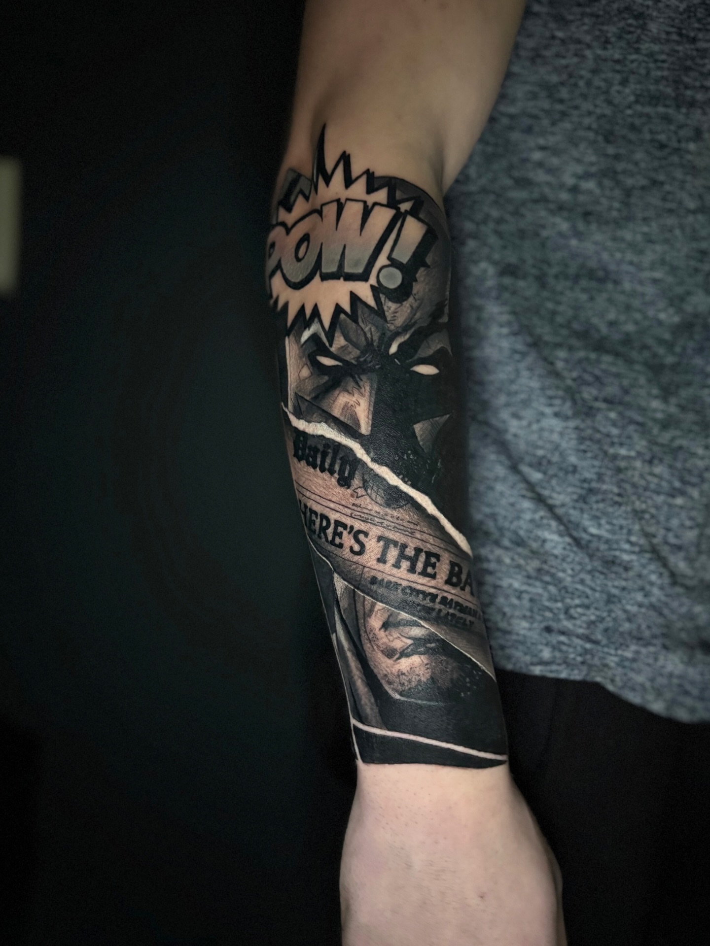Comic book panel black and grey tattoo on the forearm by Brian Overholt