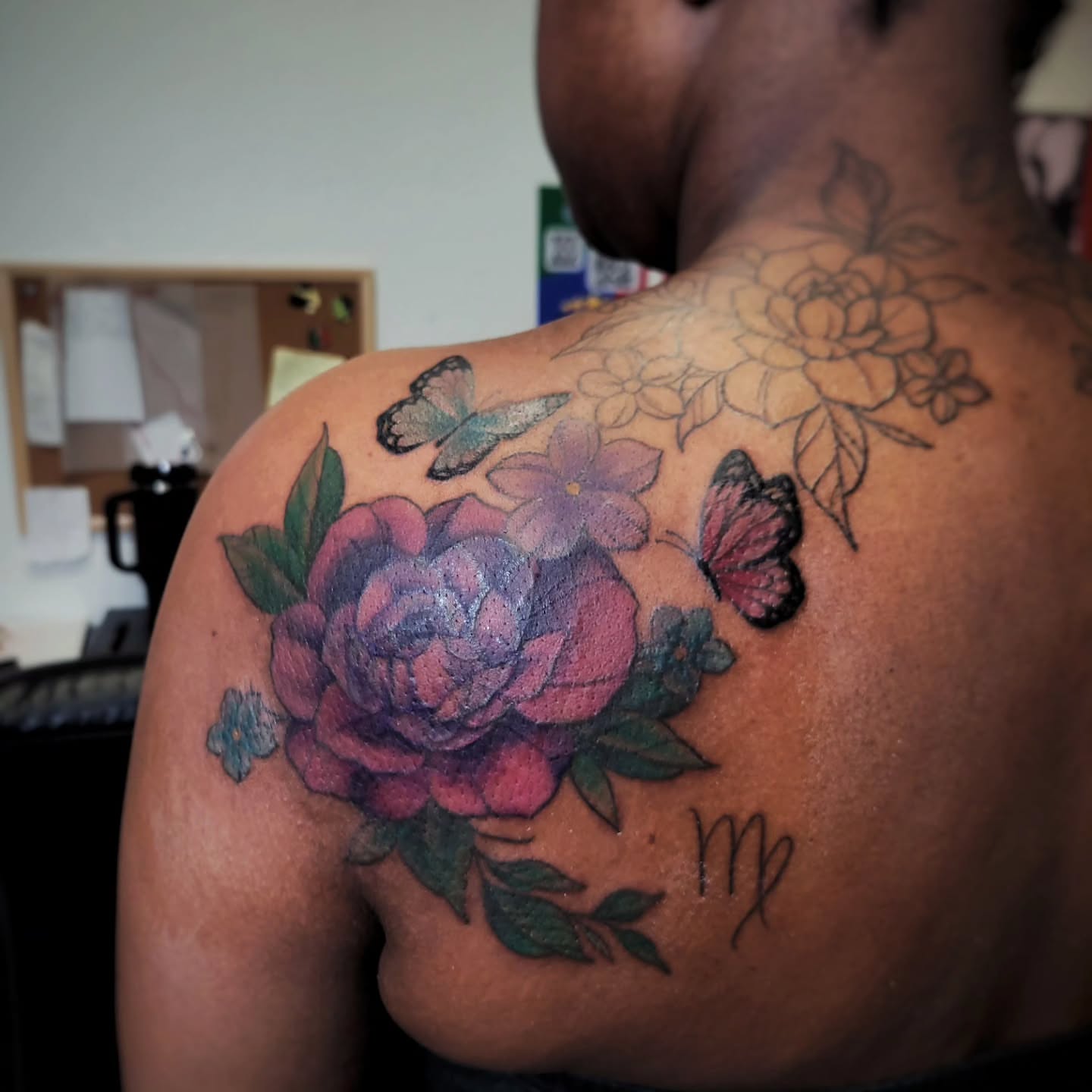 Floral bouquet new school tattoo on the shoulder by Marina Cobb